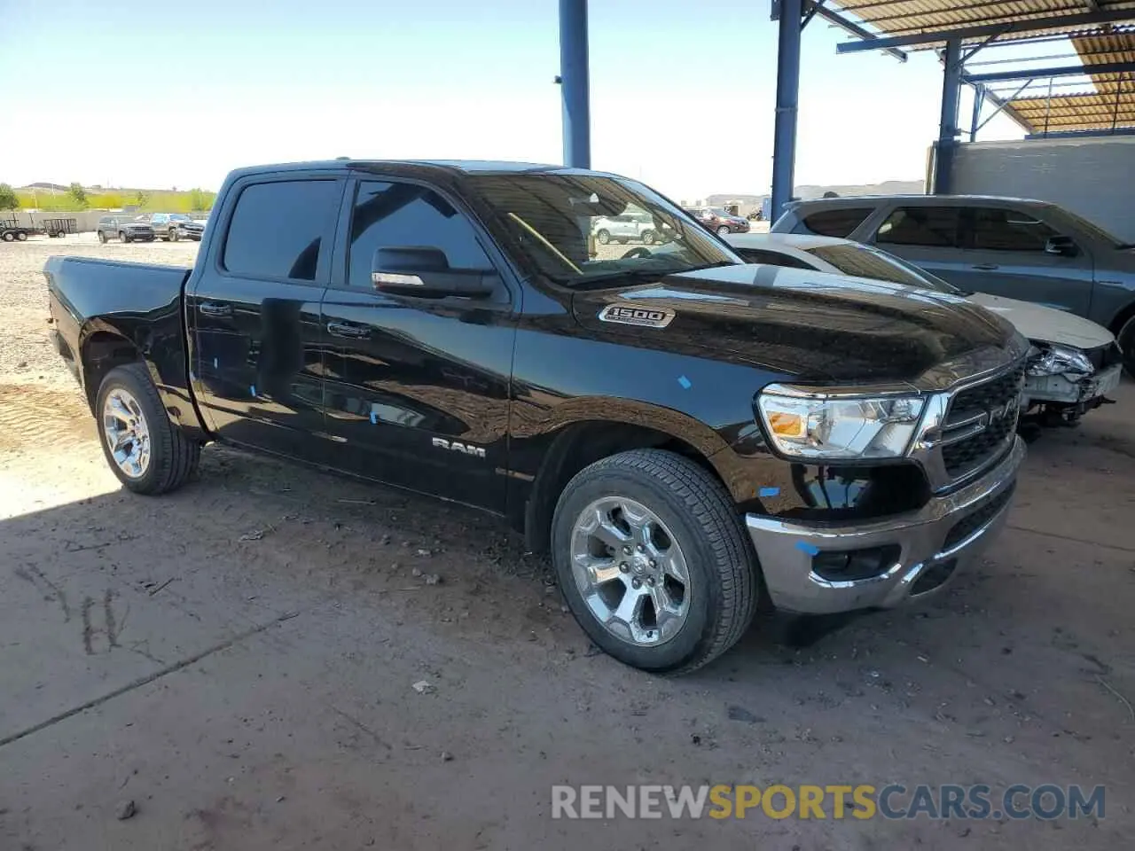 4 Photograph of a damaged car 1C6SRFFTXNN381831 RAM 1500 2022