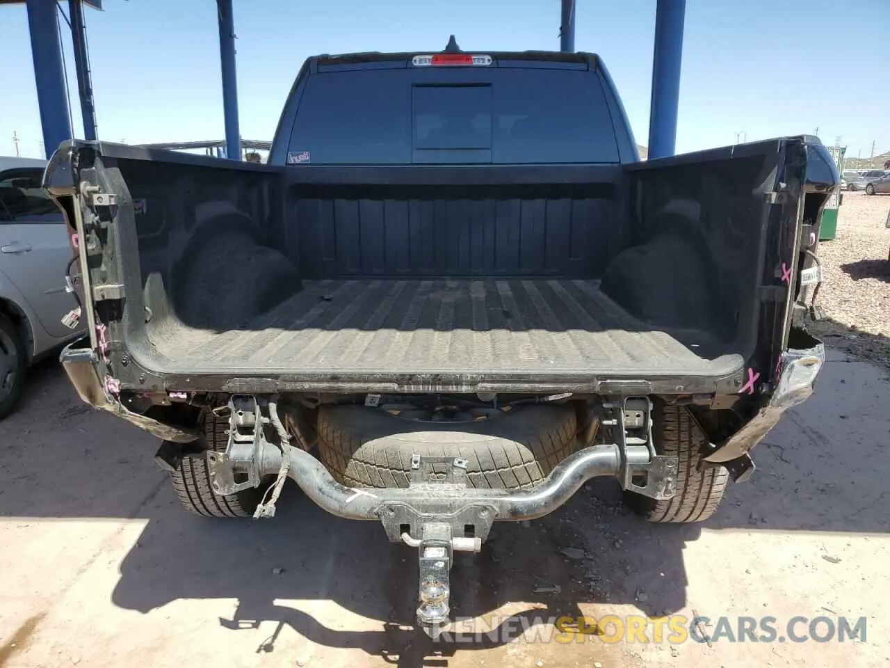 6 Photograph of a damaged car 1C6SRFFTXNN381831 RAM 1500 2022