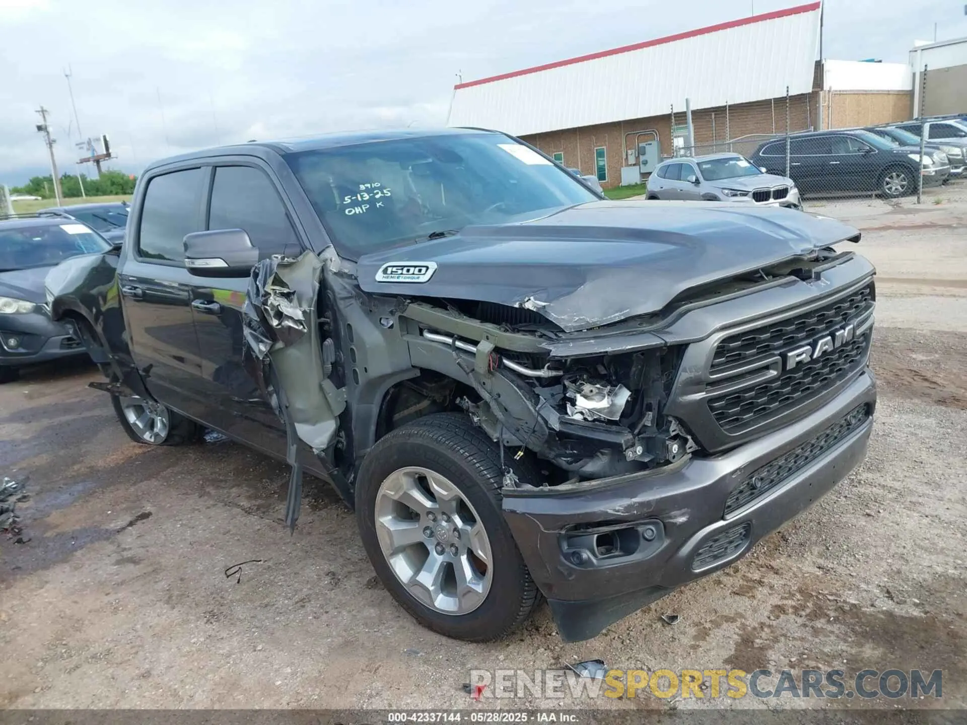 1 Photograph of a damaged car 1C6SRFFTXNN395065 RAM 1500 2022