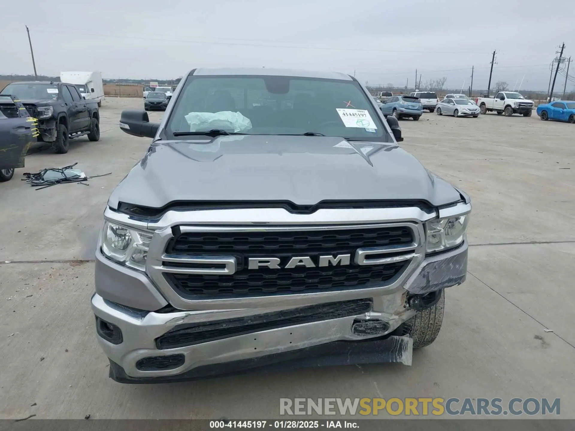 12 Photograph of a damaged car 1C6SRFFTXNN396278 RAM 1500 2022