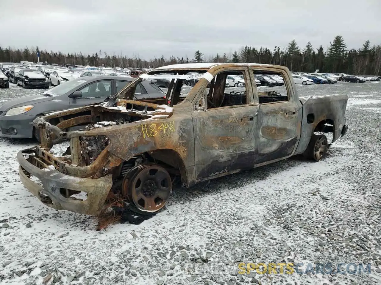 1 Photograph of a damaged car 1C6SRFGT5NN118998 RAM 1500 2022