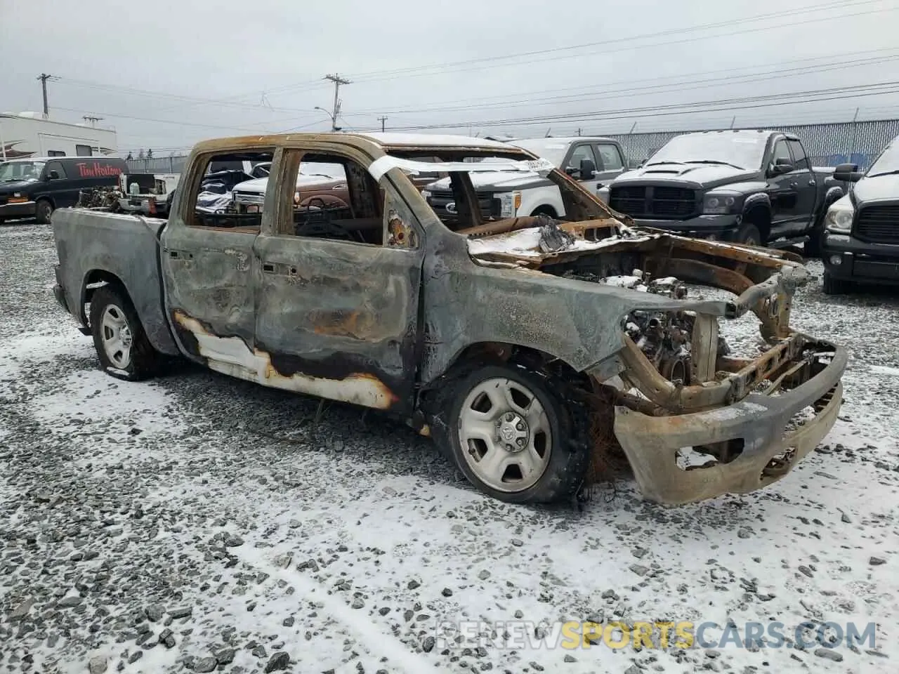 4 Photograph of a damaged car 1C6SRFGT5NN118998 RAM 1500 2022