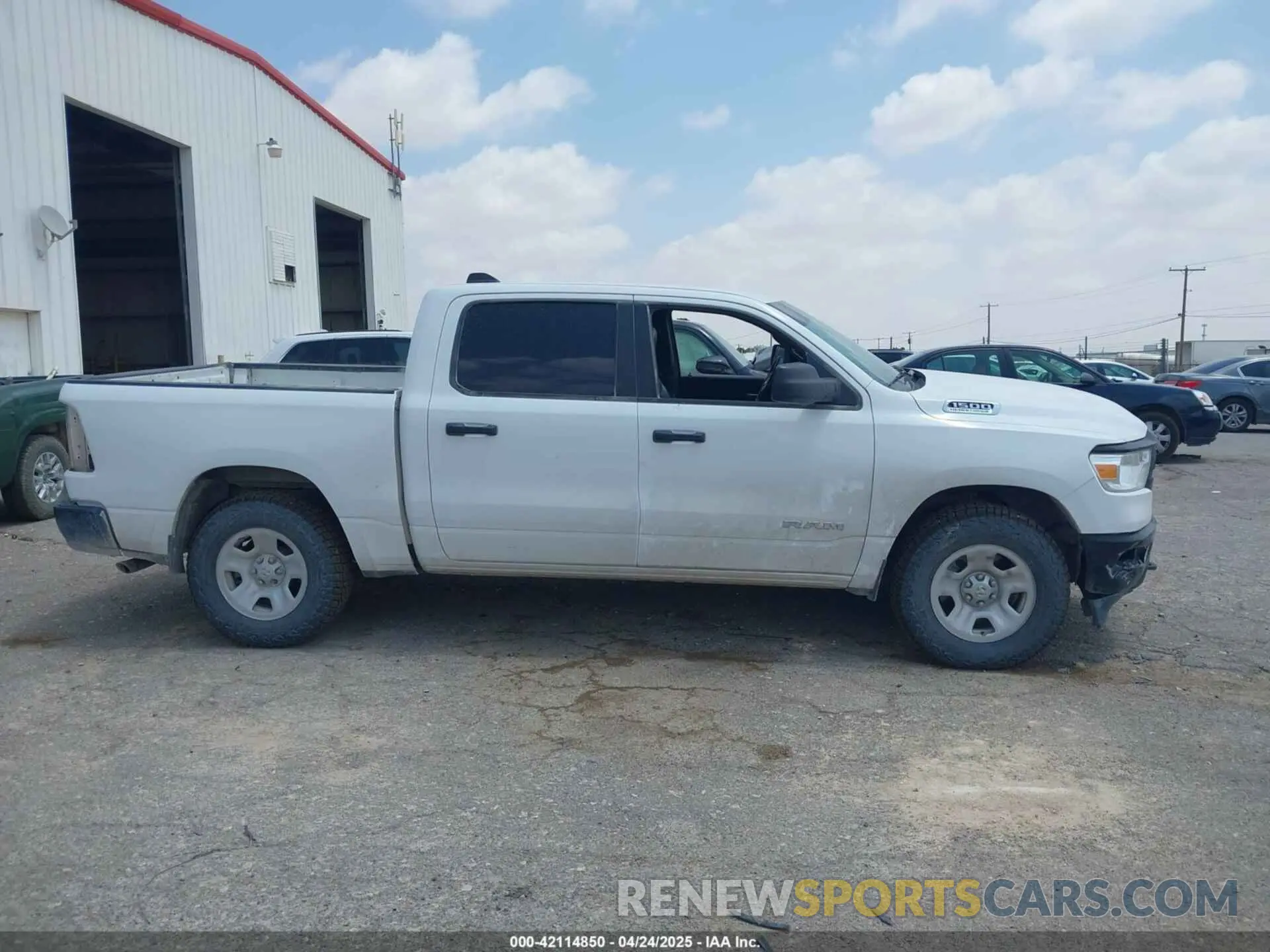 13 Photograph of a damaged car 1C6SRFGT7NN283080 RAM 1500 2022