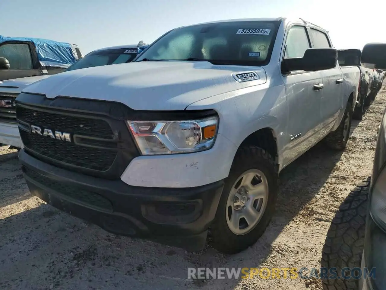 1 Photograph of a damaged car 1C6SRFGTXNN433828 RAM 1500 2022