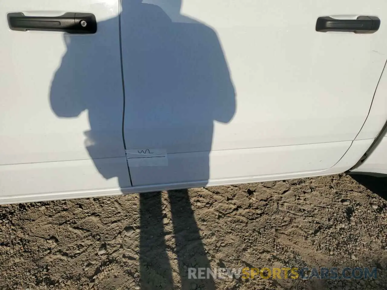 12 Photograph of a damaged car 1C6SRFGTXNN433828 RAM 1500 2022