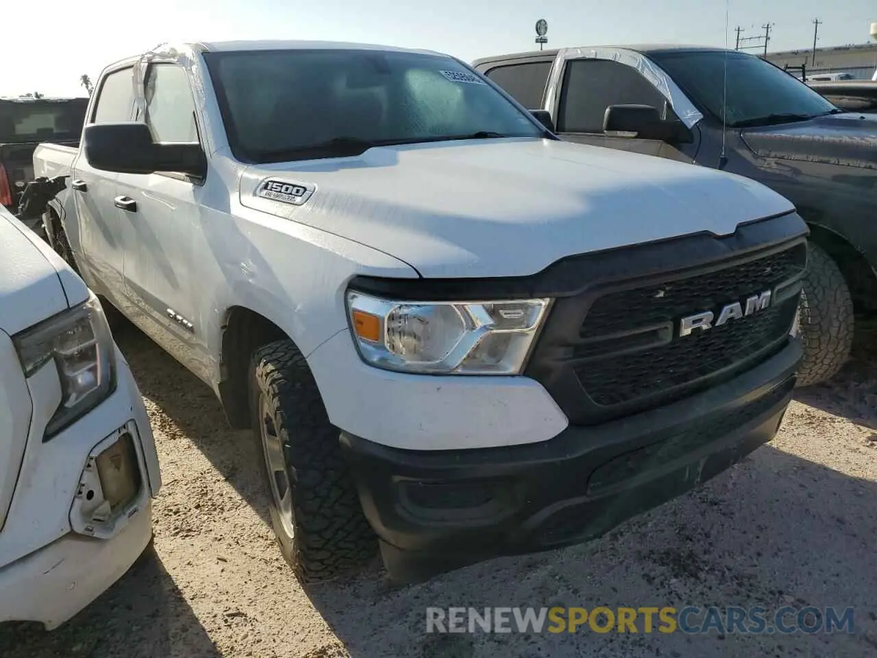 4 Photograph of a damaged car 1C6SRFGTXNN433828 RAM 1500 2022