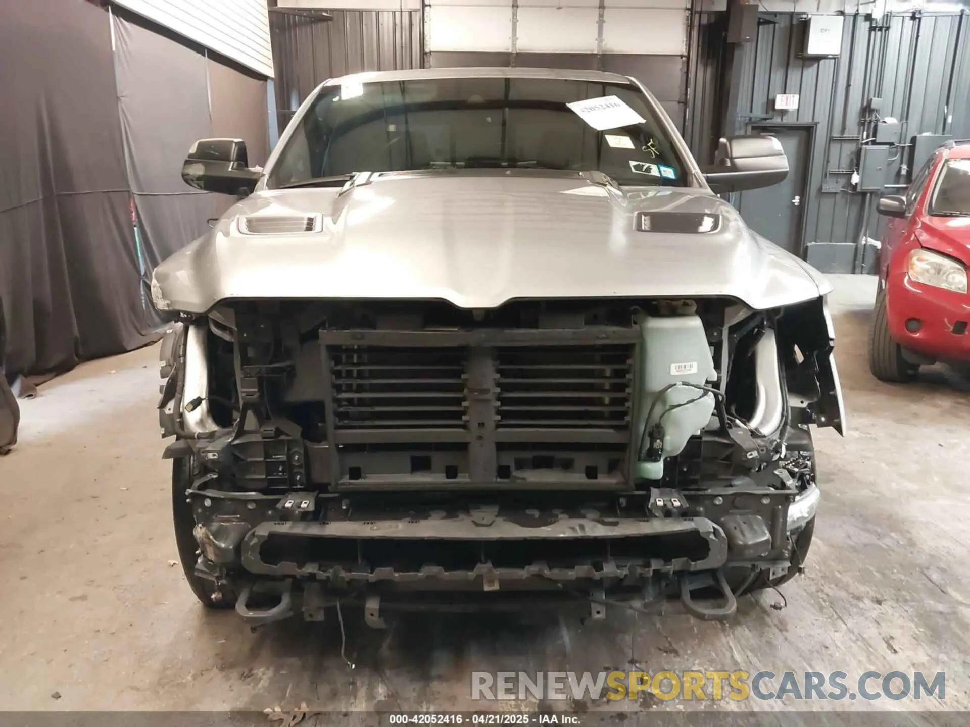 13 Photograph of a damaged car 1C6SRFHM1NN211394 RAM 1500 2022