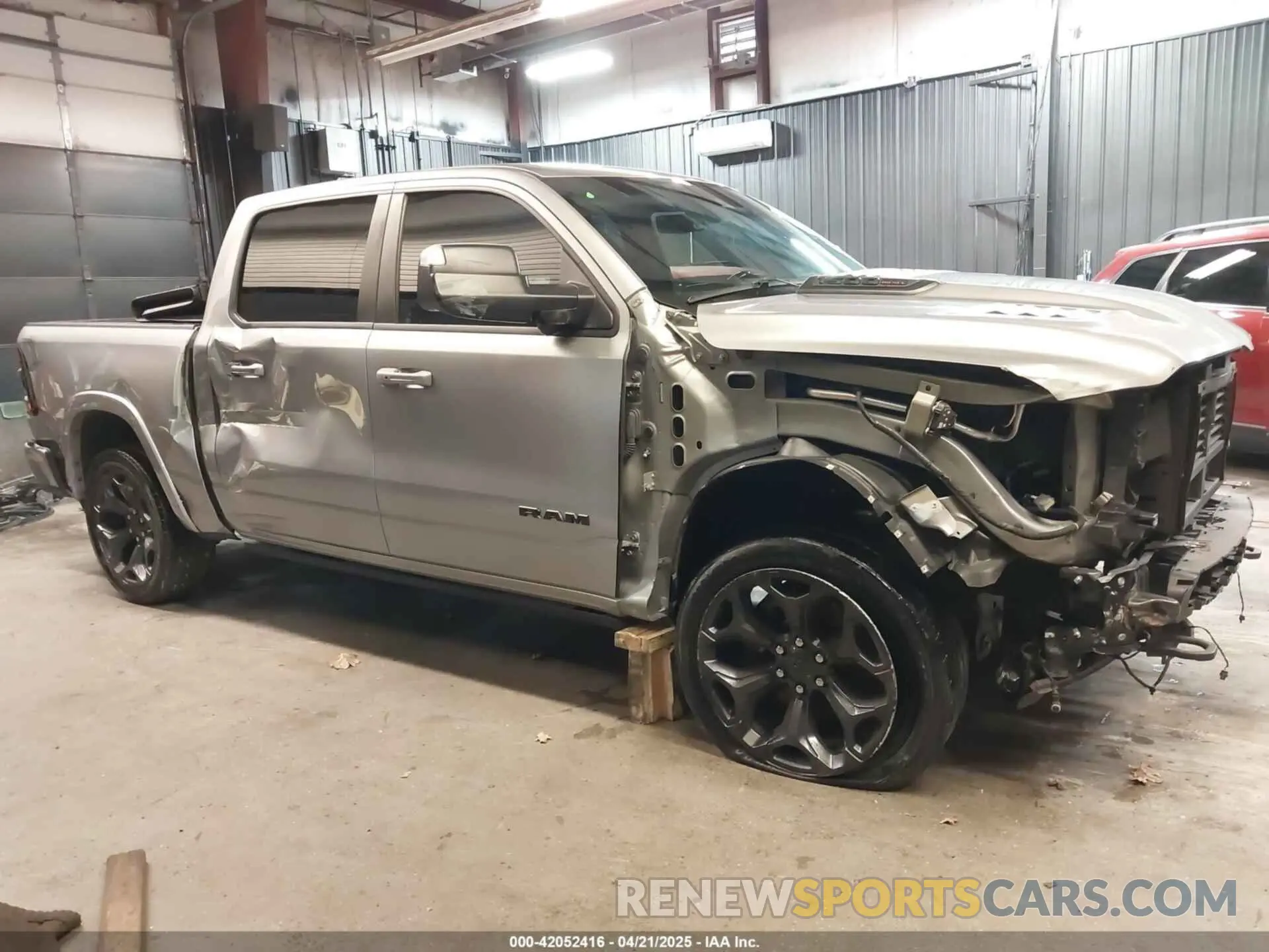 14 Photograph of a damaged car 1C6SRFHM1NN211394 RAM 1500 2022