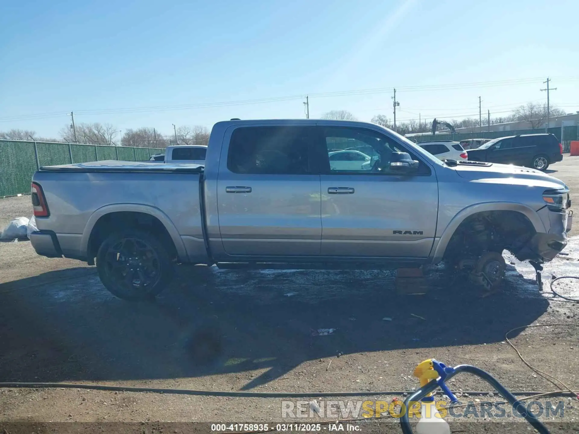 14 Photograph of a damaged car 1C6SRFHM9NN155057 RAM 1500 2022