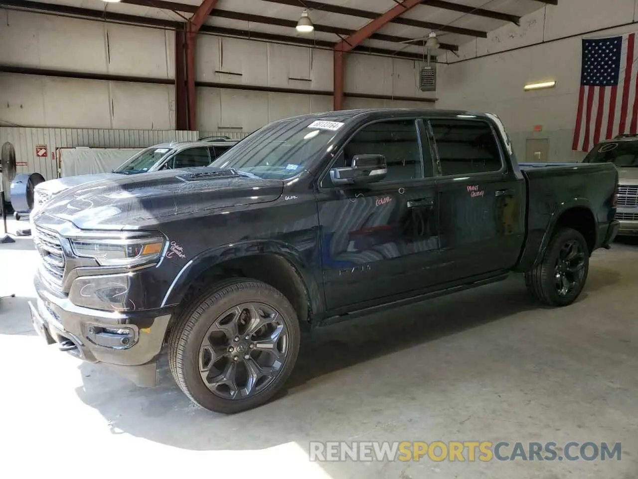 1 Photograph of a damaged car 1C6SRFHT1NN297250 RAM 1500 2022