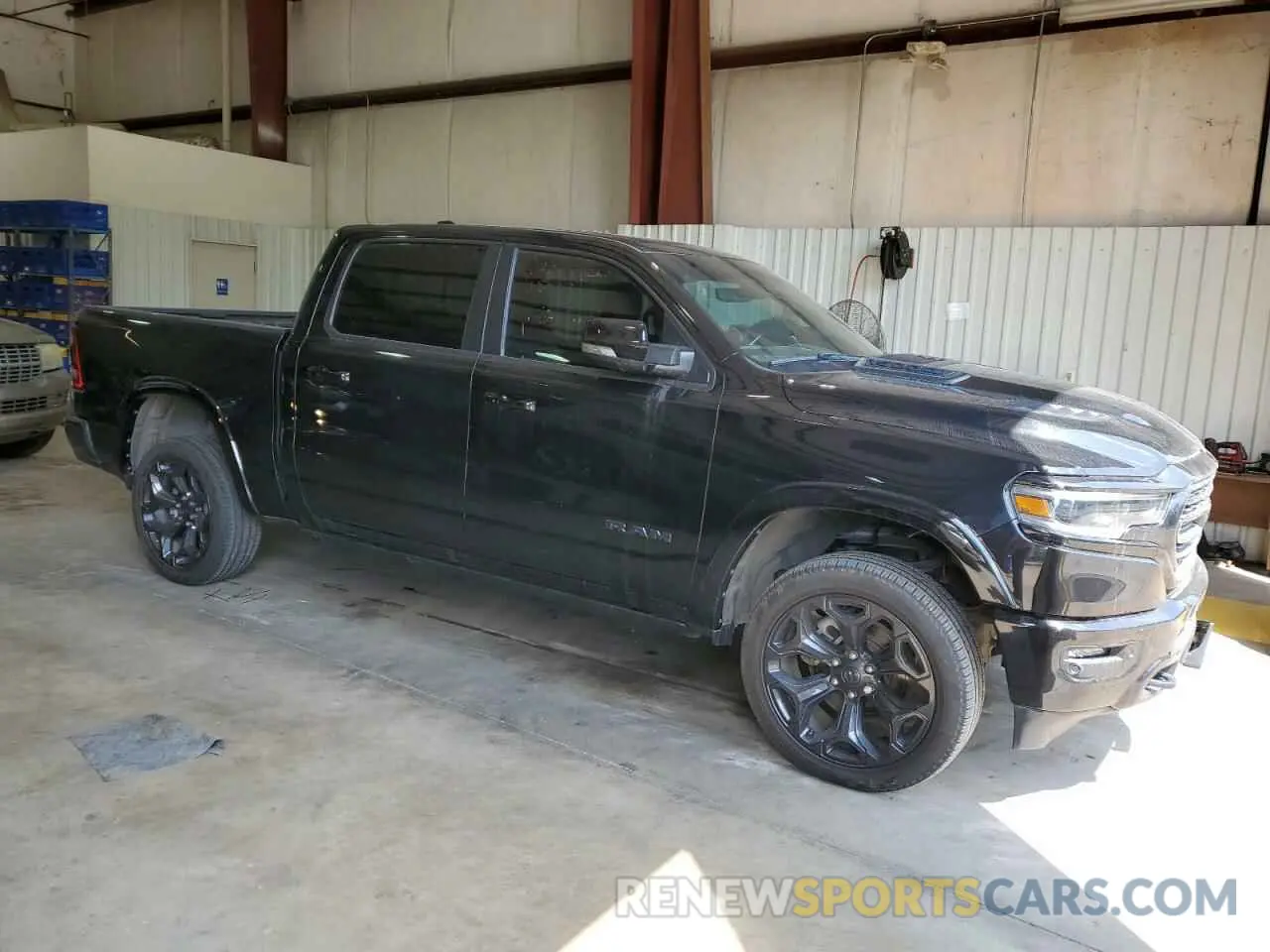 4 Photograph of a damaged car 1C6SRFHT1NN297250 RAM 1500 2022