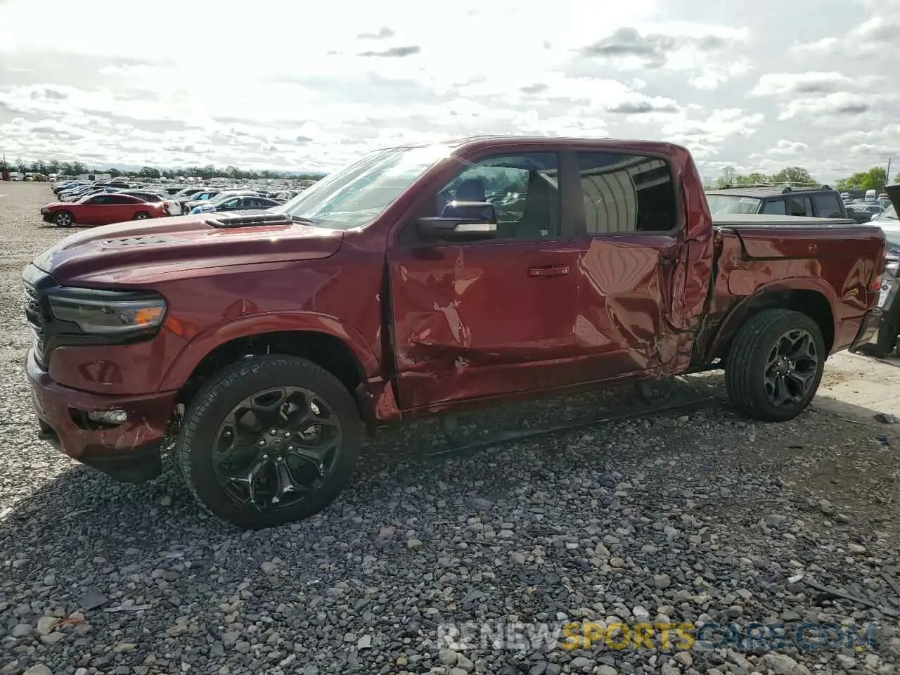 1 Photograph of a damaged car 1C6SRFHT3NN320835 RAM 1500 2022