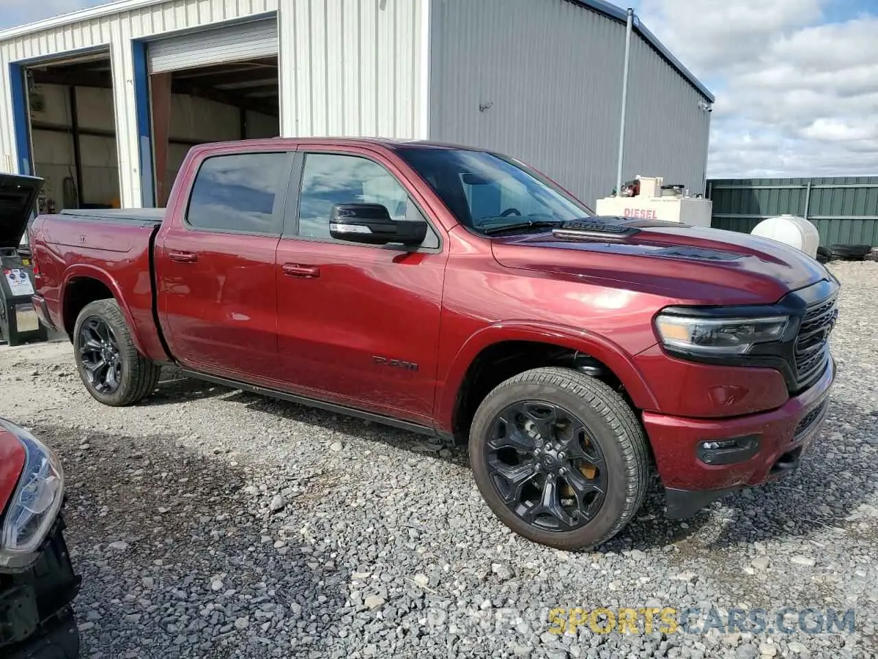 4 Photograph of a damaged car 1C6SRFHT3NN320835 RAM 1500 2022
