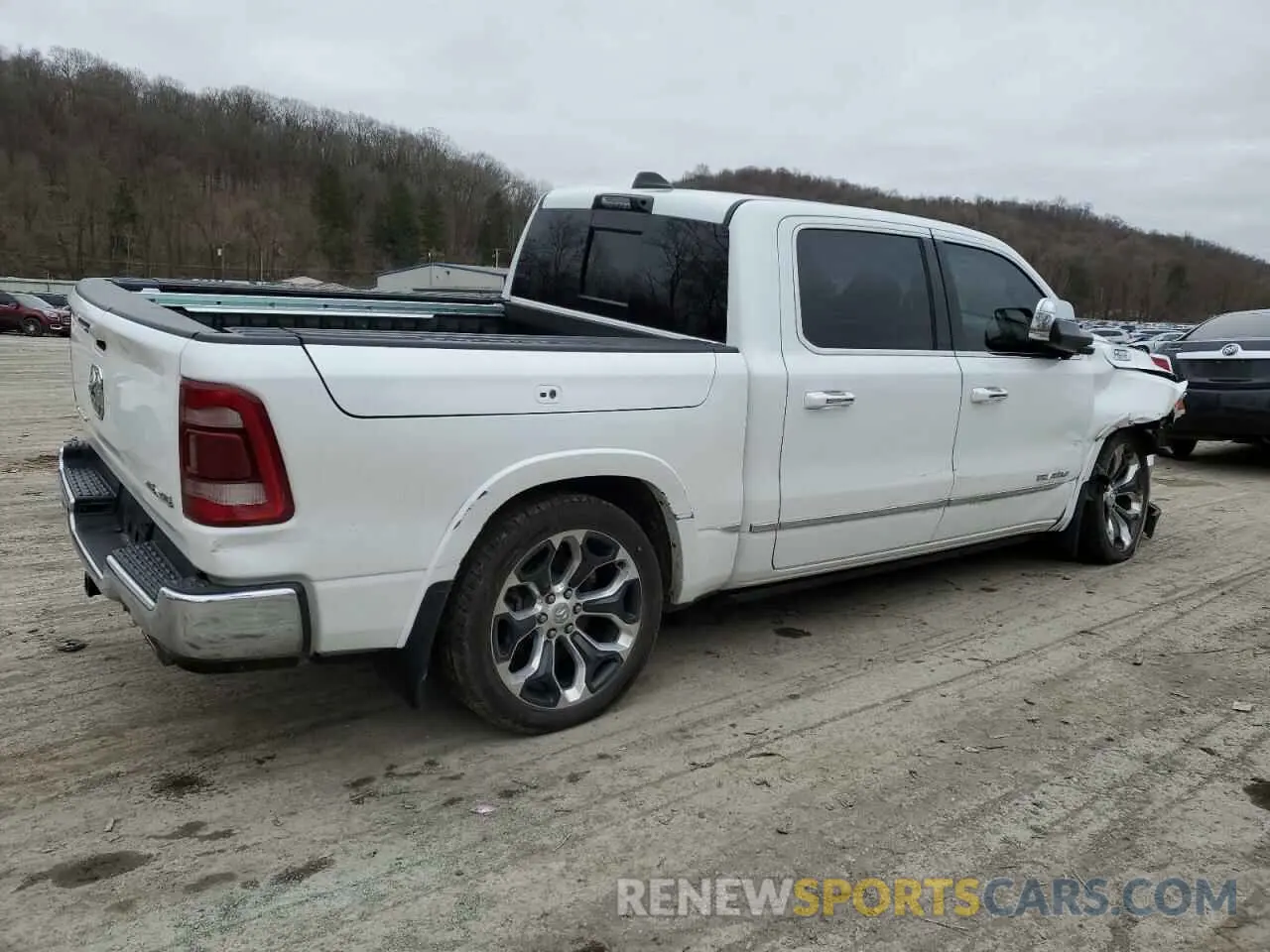 3 Photograph of a damaged car 1C6SRFHT4NN195229 RAM 1500 2022