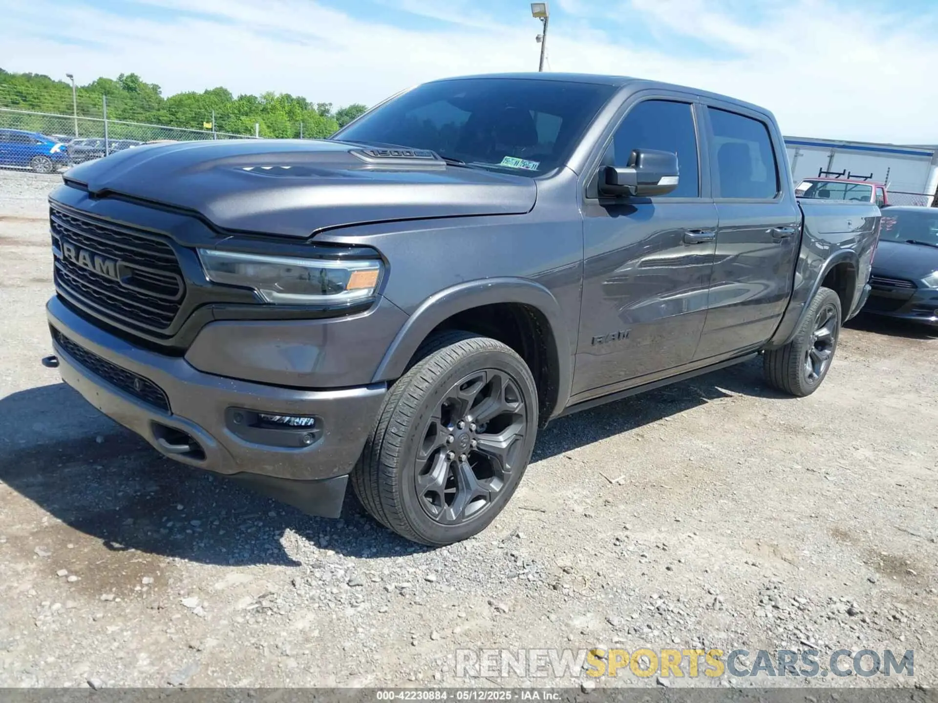 2 Photograph of a damaged car 1C6SRFHT5NN332002 RAM 1500 2022