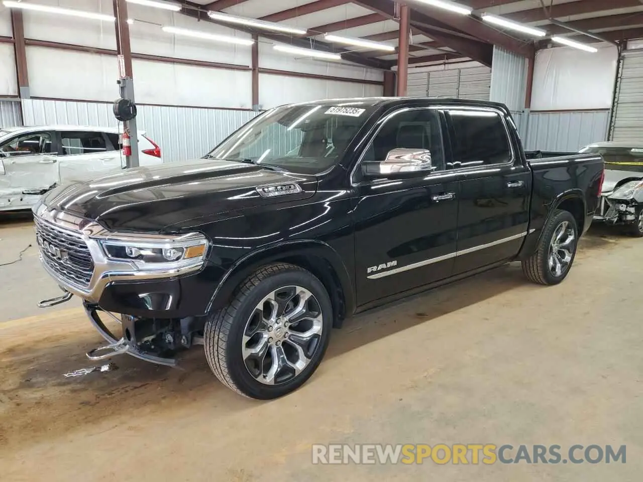 1 Photograph of a damaged car 1C6SRFHT6NN171384 RAM 1500 2022