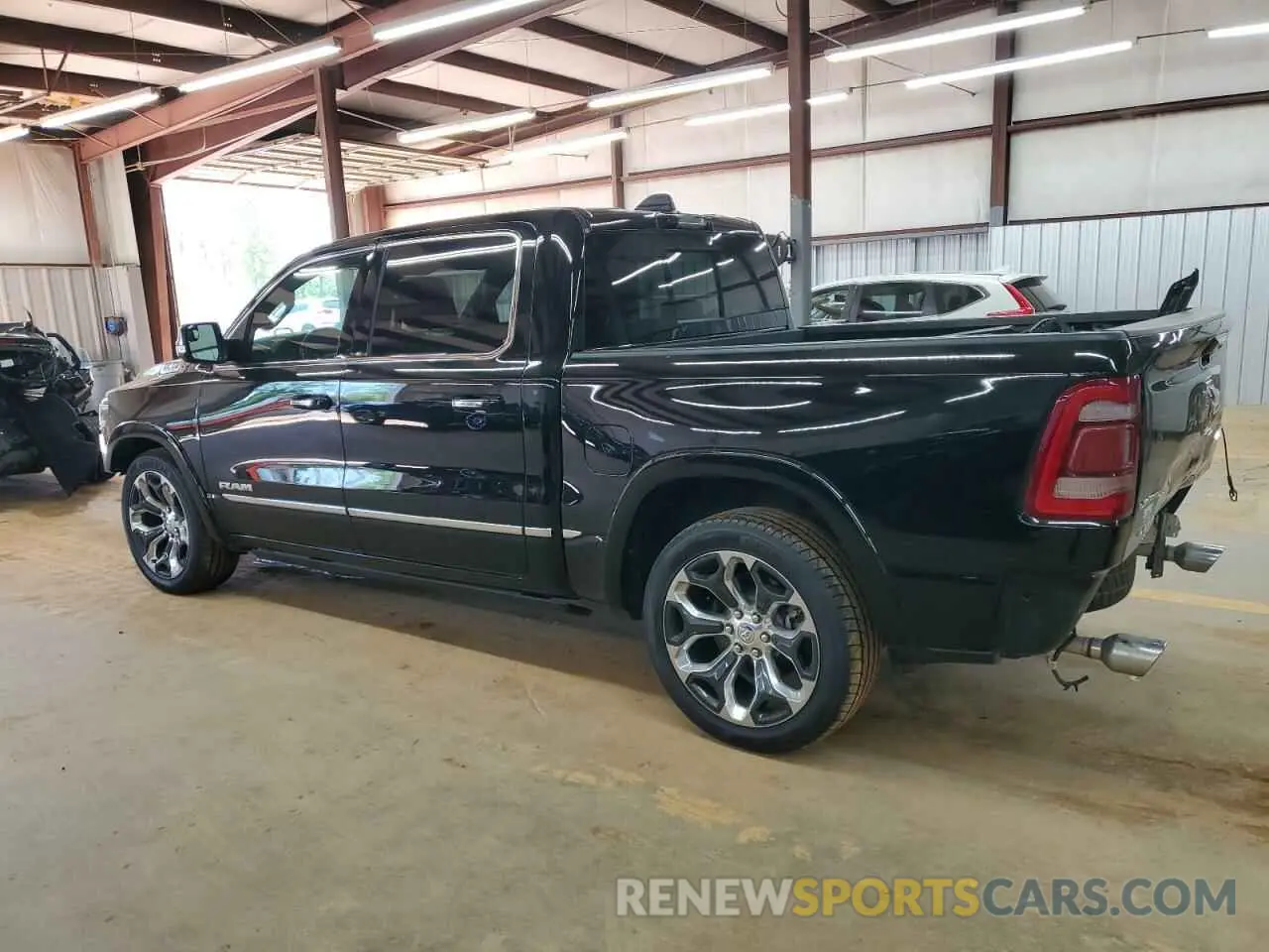 2 Photograph of a damaged car 1C6SRFHT6NN171384 RAM 1500 2022