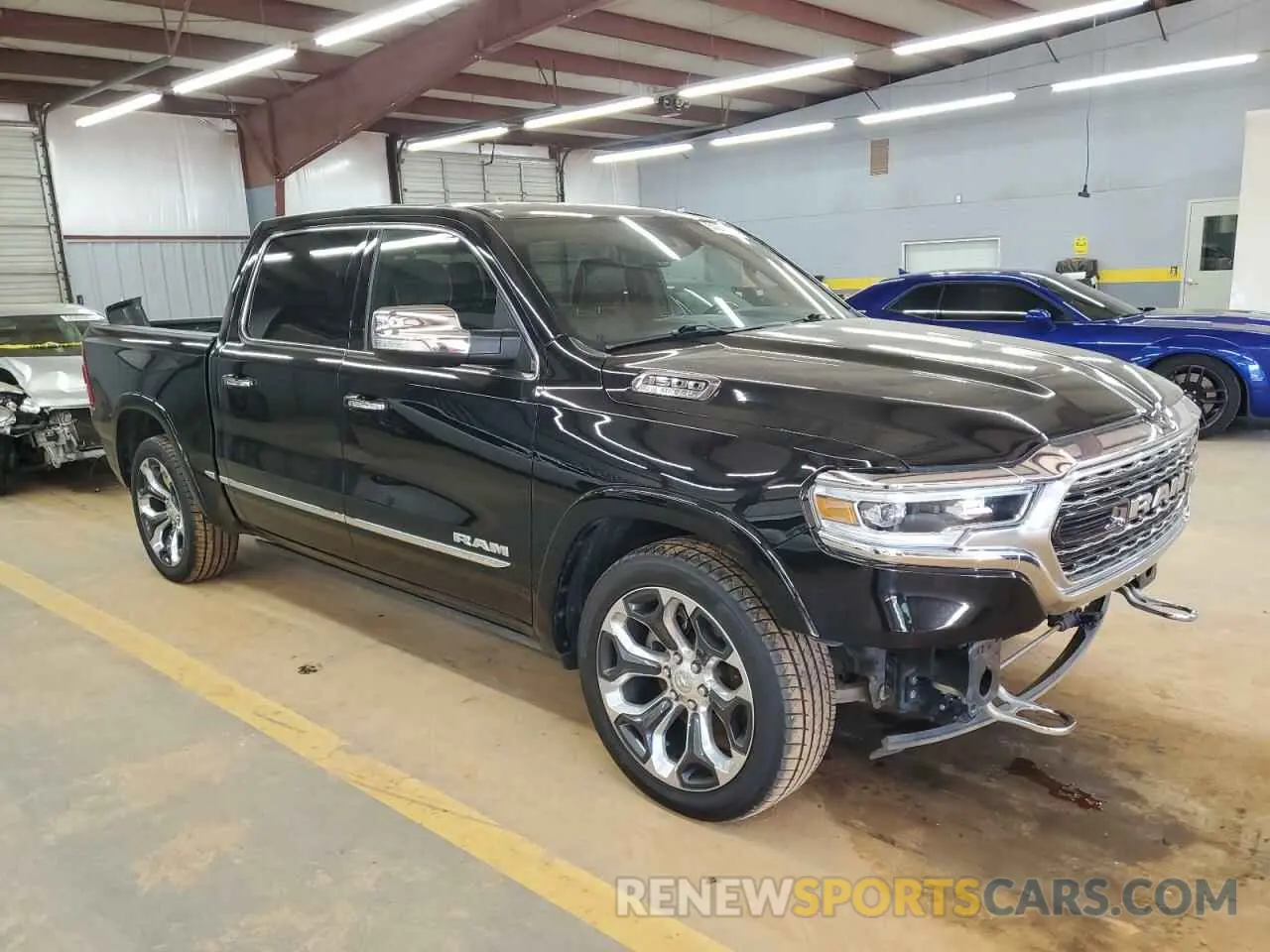 4 Photograph of a damaged car 1C6SRFHT6NN171384 RAM 1500 2022