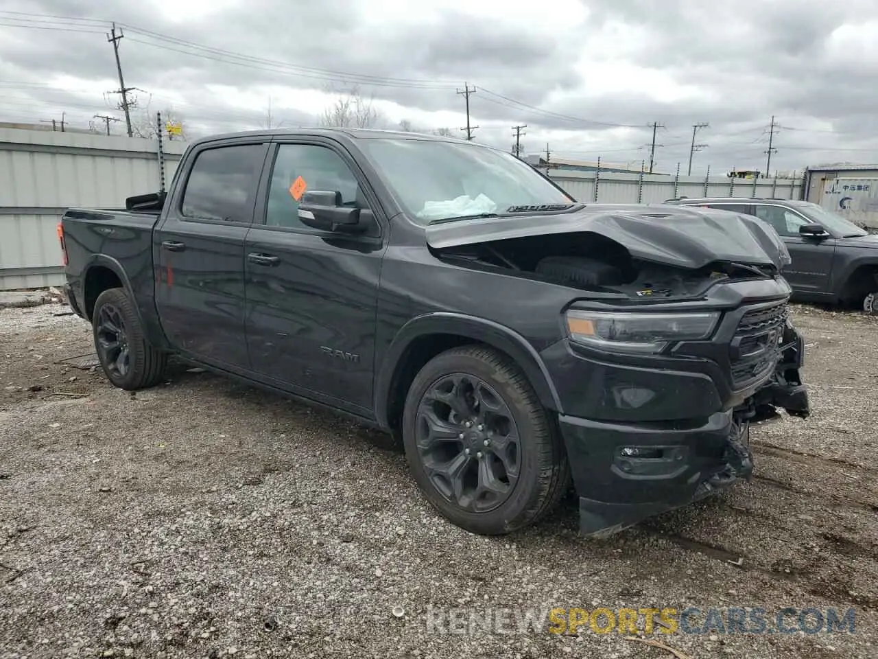 4 Photograph of a damaged car 1C6SRFHT8NN380674 RAM 1500 2022