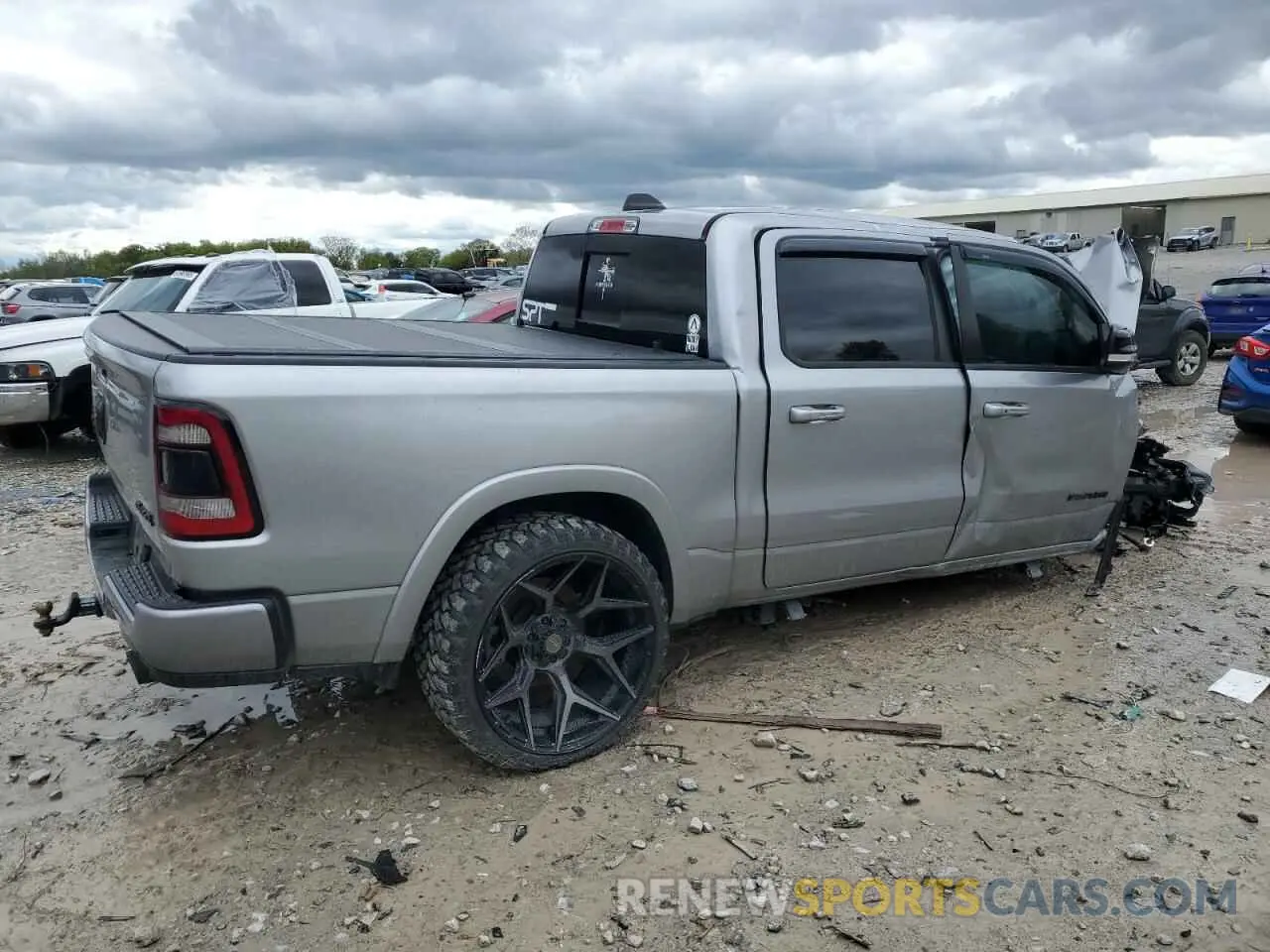 3 Photograph of a damaged car 1C6SRFHTXNN266448 RAM 1500 2022