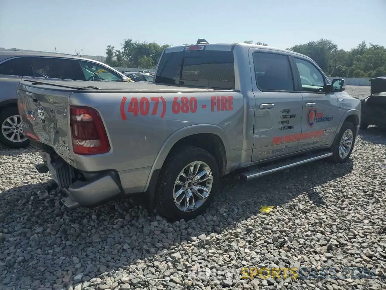 3 Photograph of a damaged car 1C6SRFJT0NN225045 RAM 1500 2022