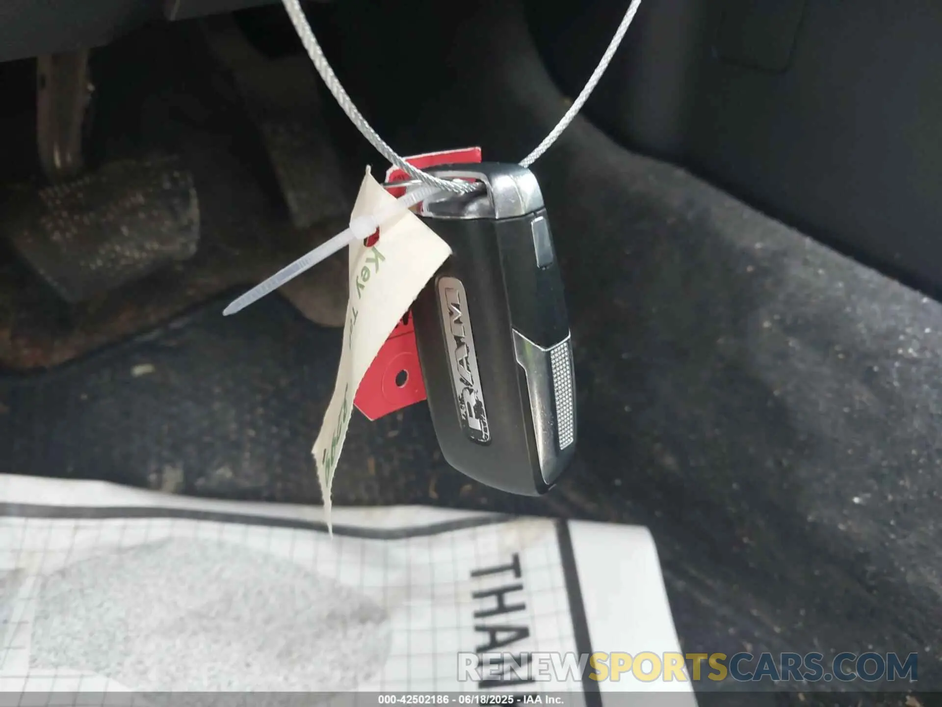 11 Photograph of a damaged car 1C6SRFJT0NN300228 RAM 1500 2022