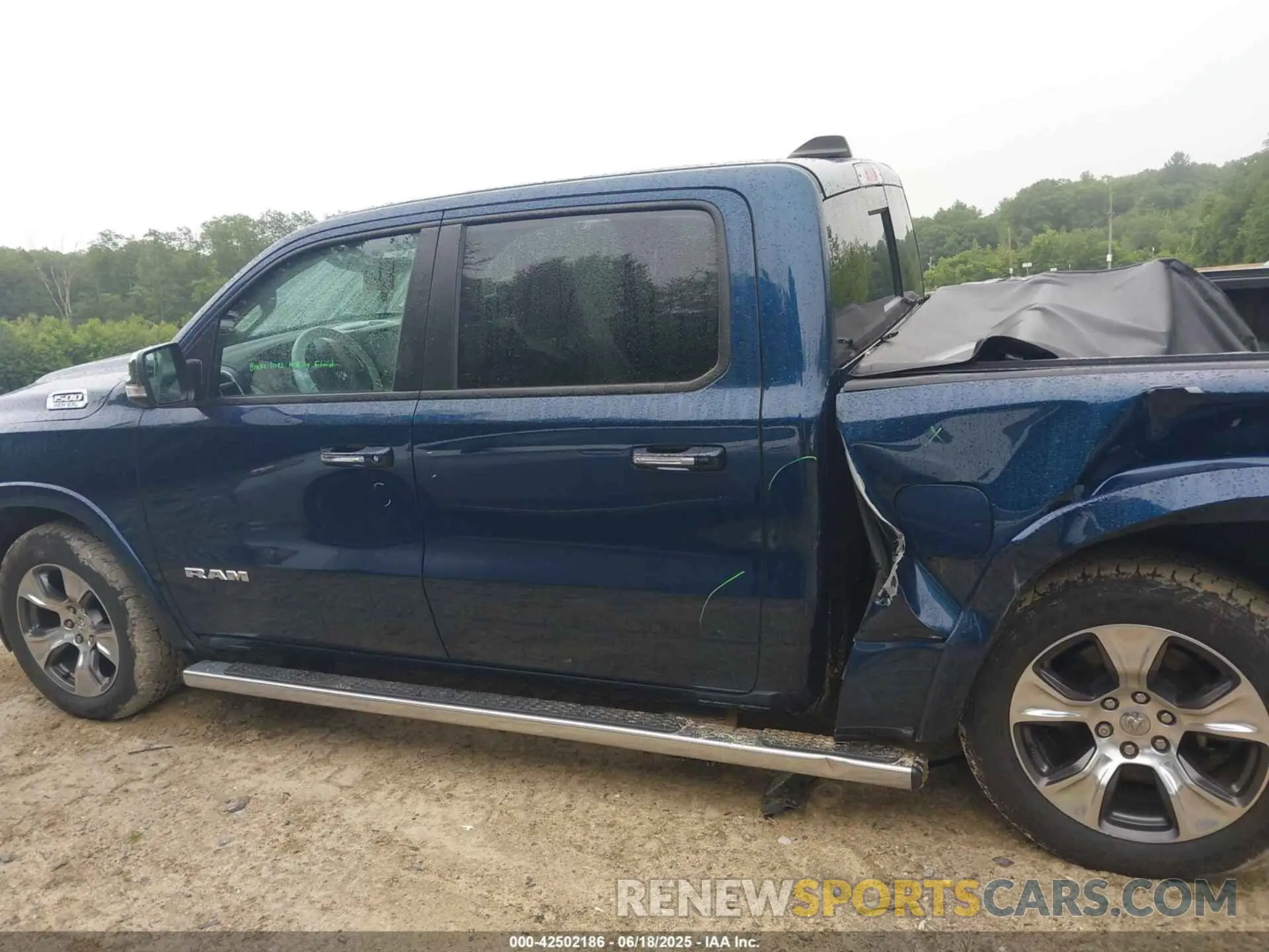 14 Photograph of a damaged car 1C6SRFJT0NN300228 RAM 1500 2022
