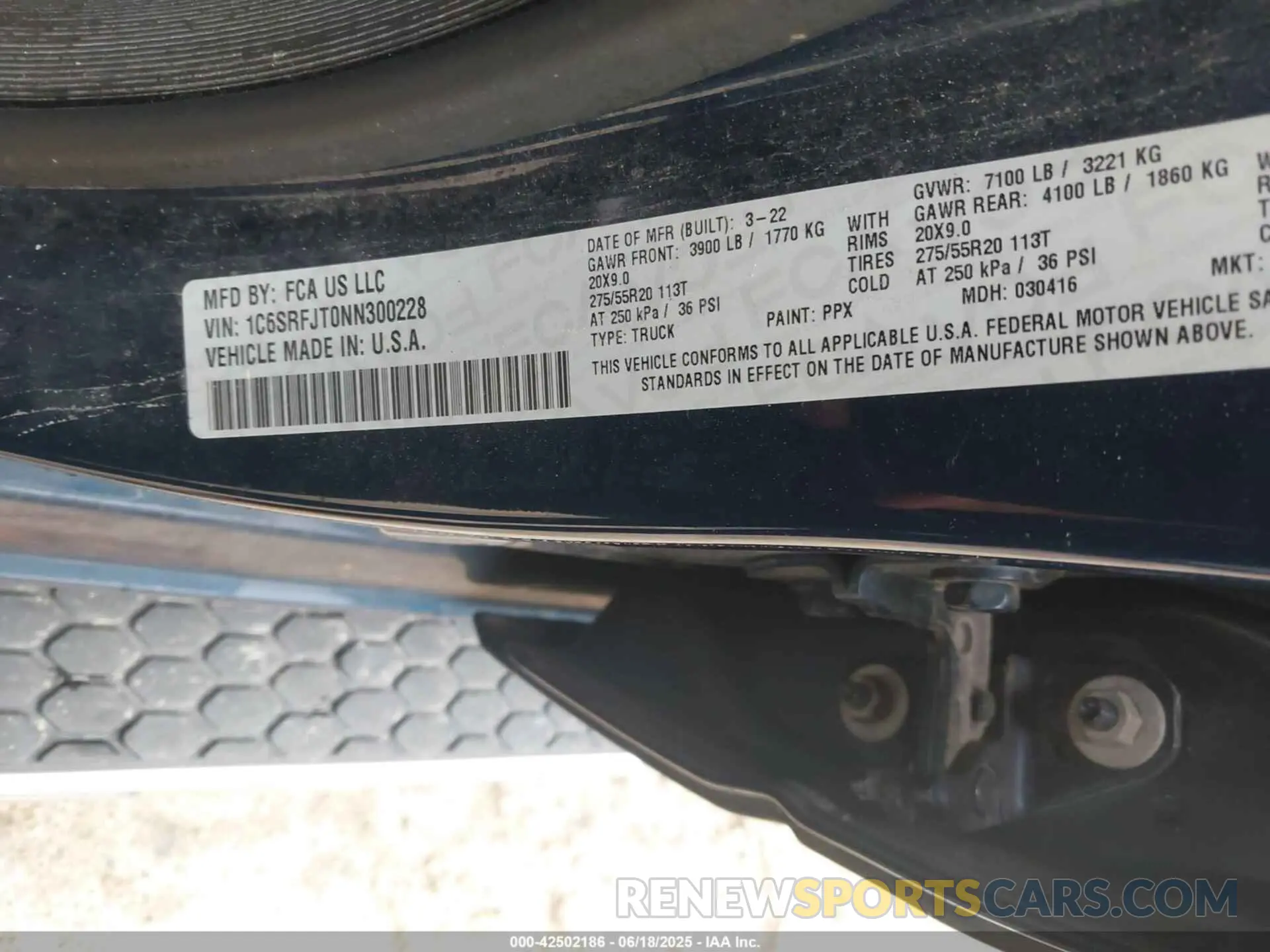 9 Photograph of a damaged car 1C6SRFJT0NN300228 RAM 1500 2022