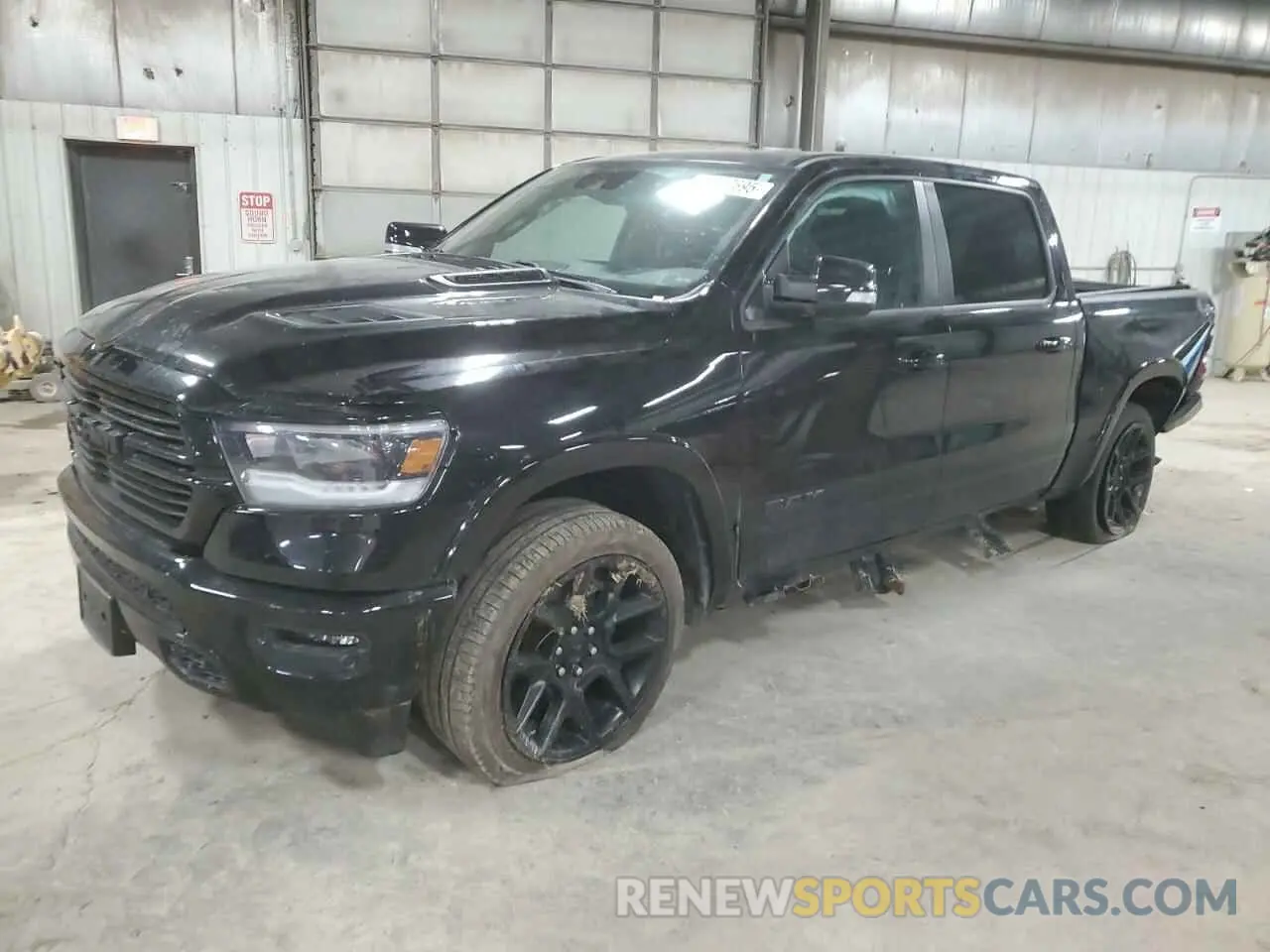 1 Photograph of a damaged car 1C6SRFJT0NN474798 RAM 1500 2022