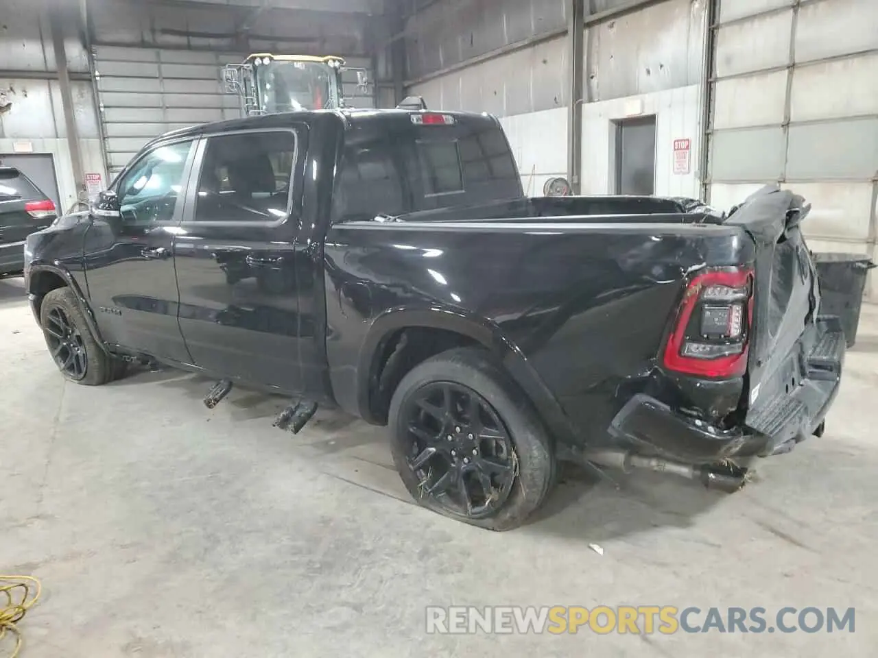 2 Photograph of a damaged car 1C6SRFJT0NN474798 RAM 1500 2022