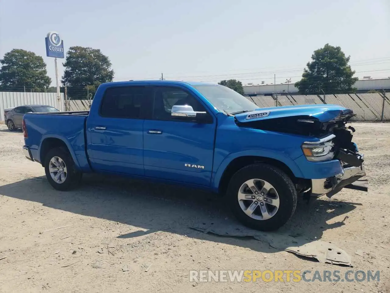 4 Photograph of a damaged car 1C6SRFJT1NN179158 RAM 1500 2022