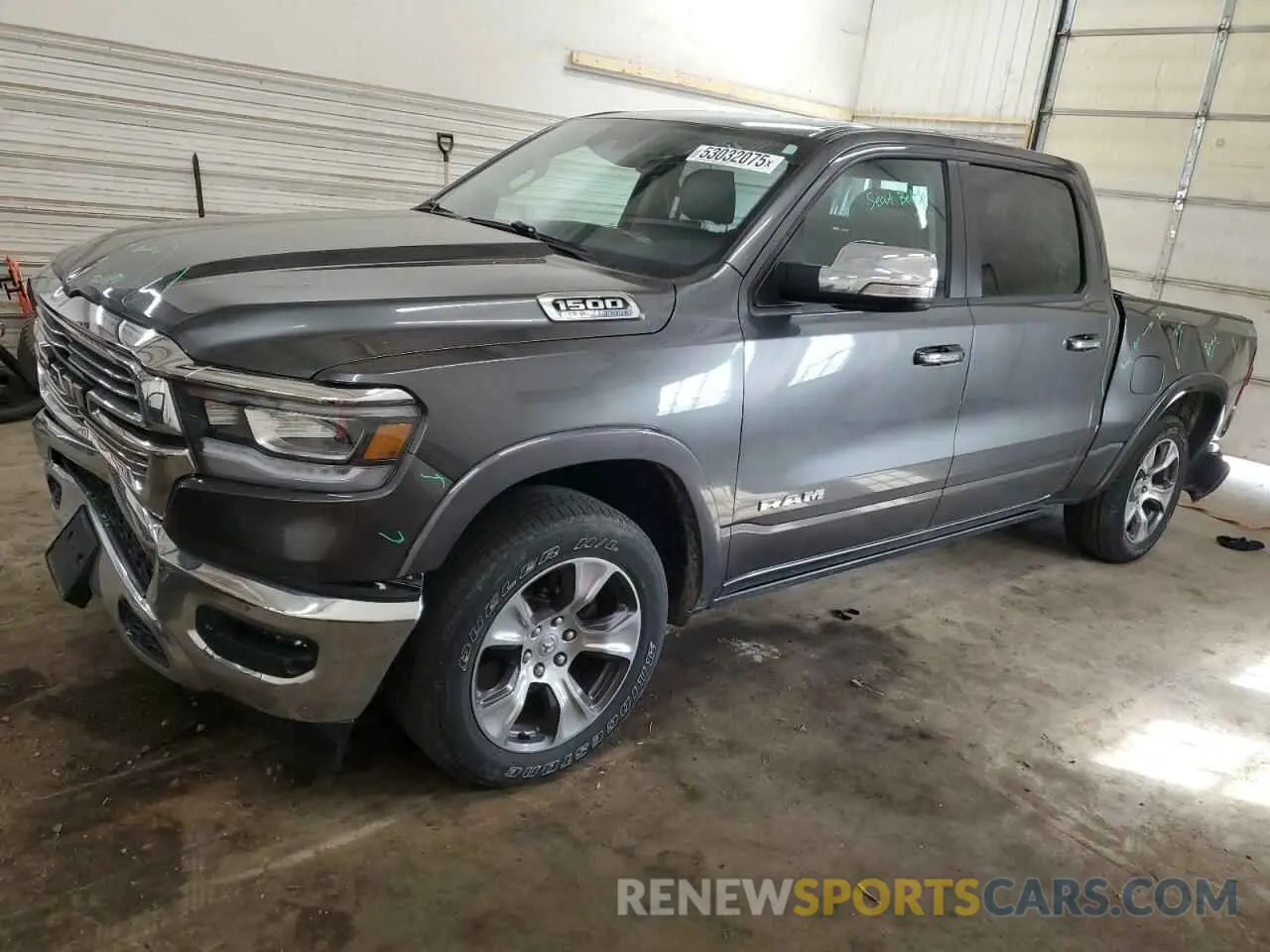 1 Photograph of a damaged car 1C6SRFJT1NN322738 RAM 1500 2022