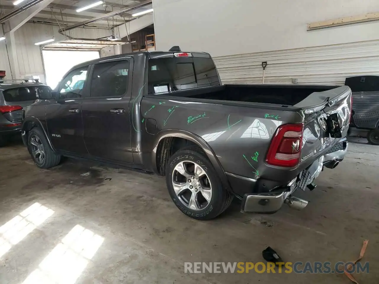 2 Photograph of a damaged car 1C6SRFJT1NN322738 RAM 1500 2022