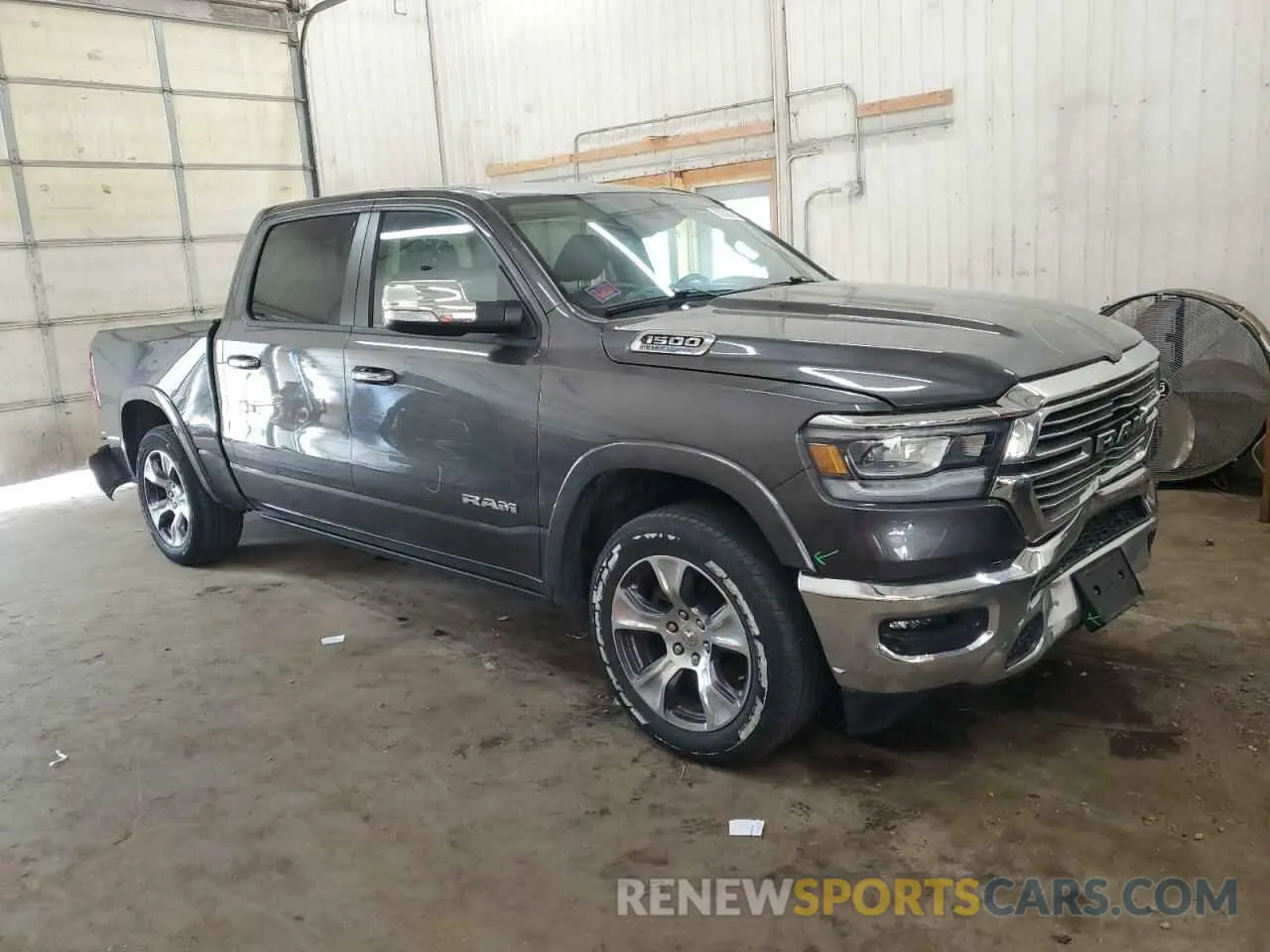 4 Photograph of a damaged car 1C6SRFJT1NN322738 RAM 1500 2022