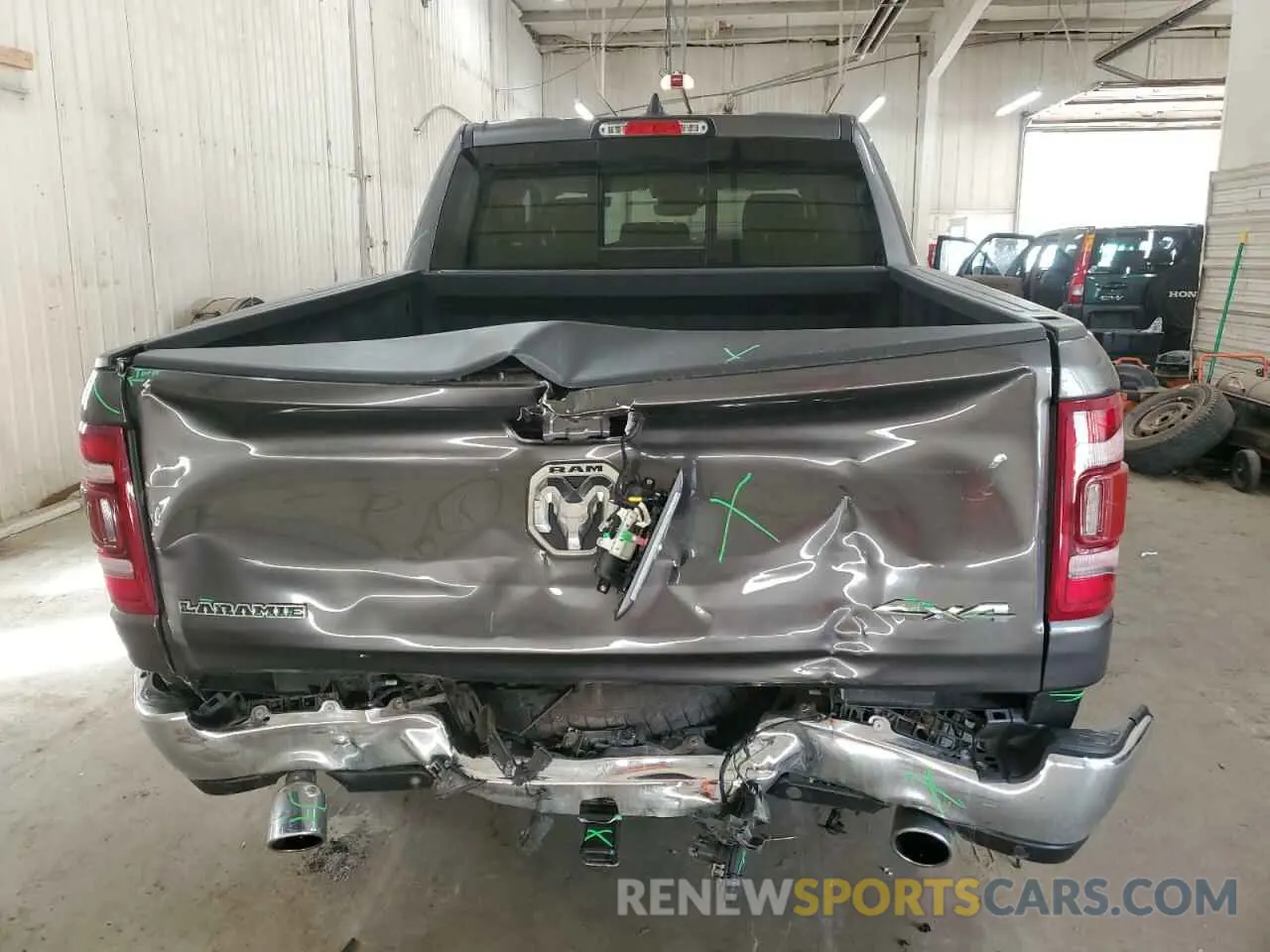 6 Photograph of a damaged car 1C6SRFJT1NN322738 RAM 1500 2022