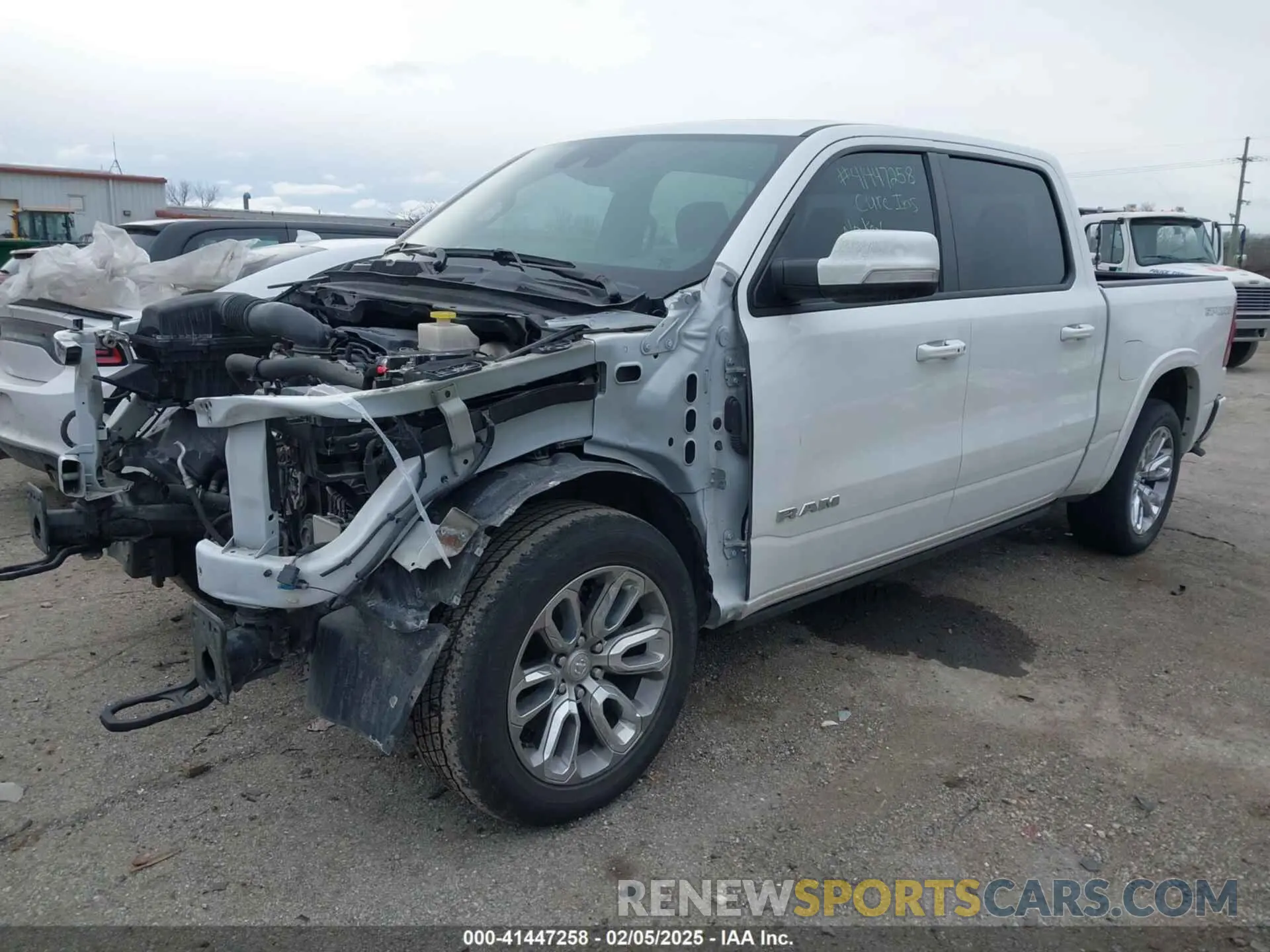 2 Photograph of a damaged car 1C6SRFJT2NN189939 RAM 1500 2022