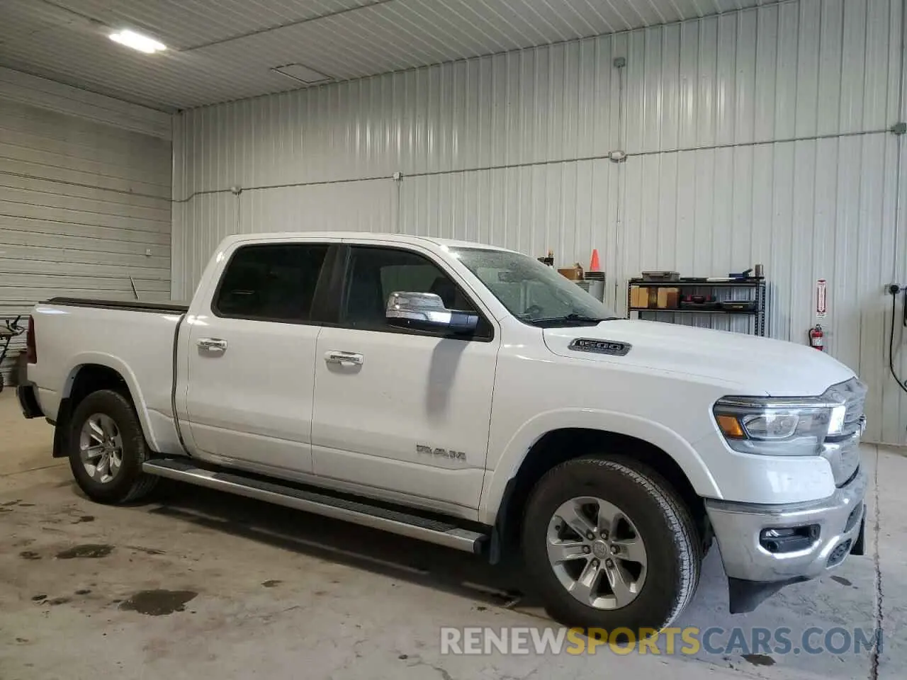 4 Photograph of a damaged car 1C6SRFJT2NN394502 RAM 1500 2022