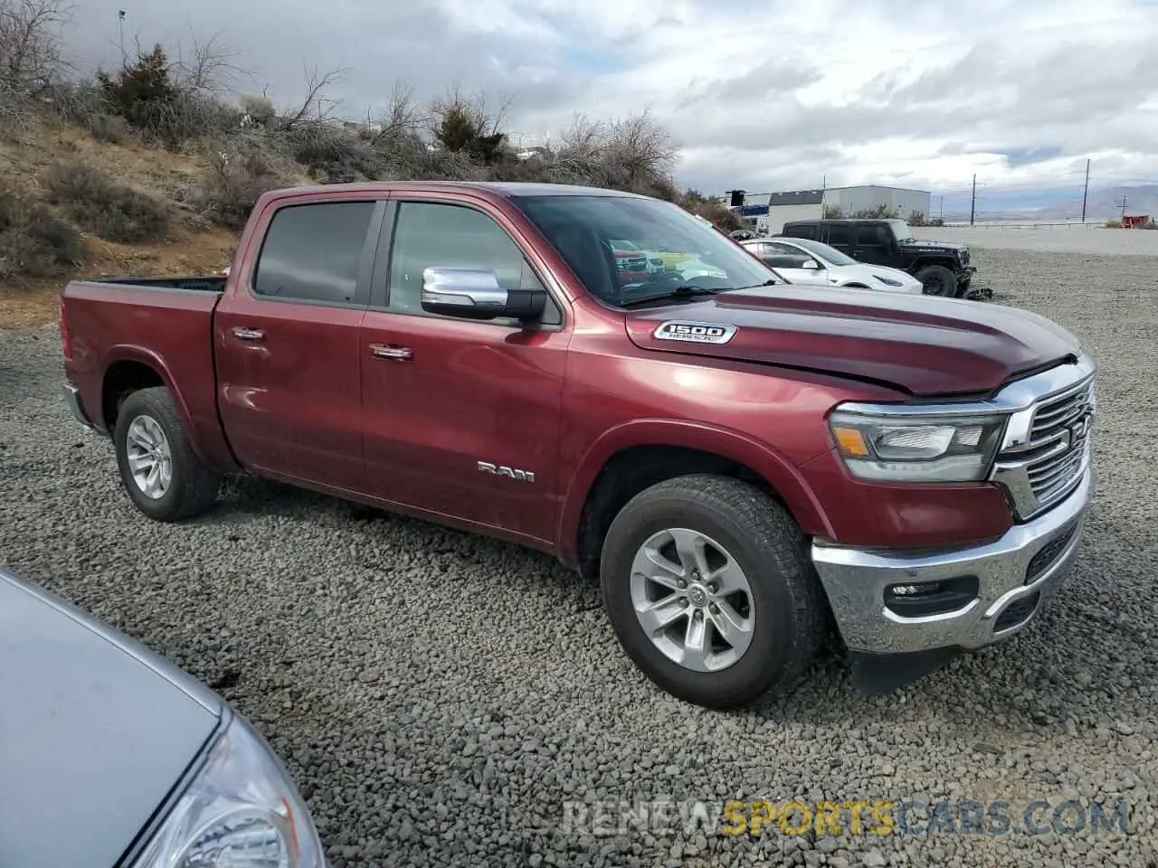 4 Photograph of a damaged car 1C6SRFJT3NN248495 RAM 1500 2022