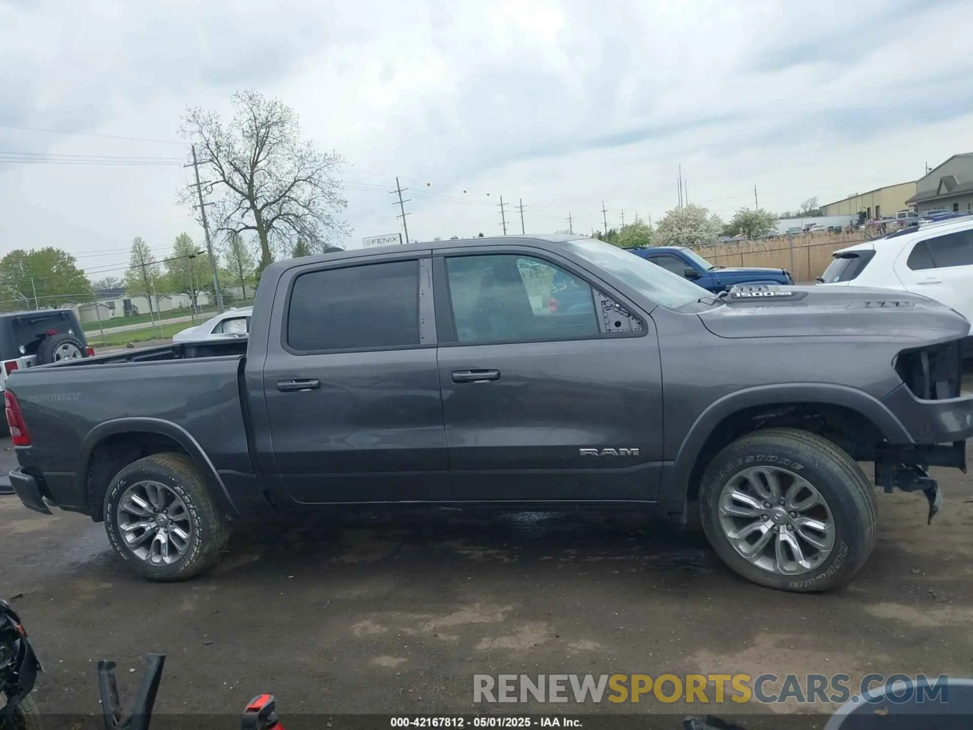 13 Photograph of a damaged car 1C6SRFJT3NN400159 RAM 1500 2022
