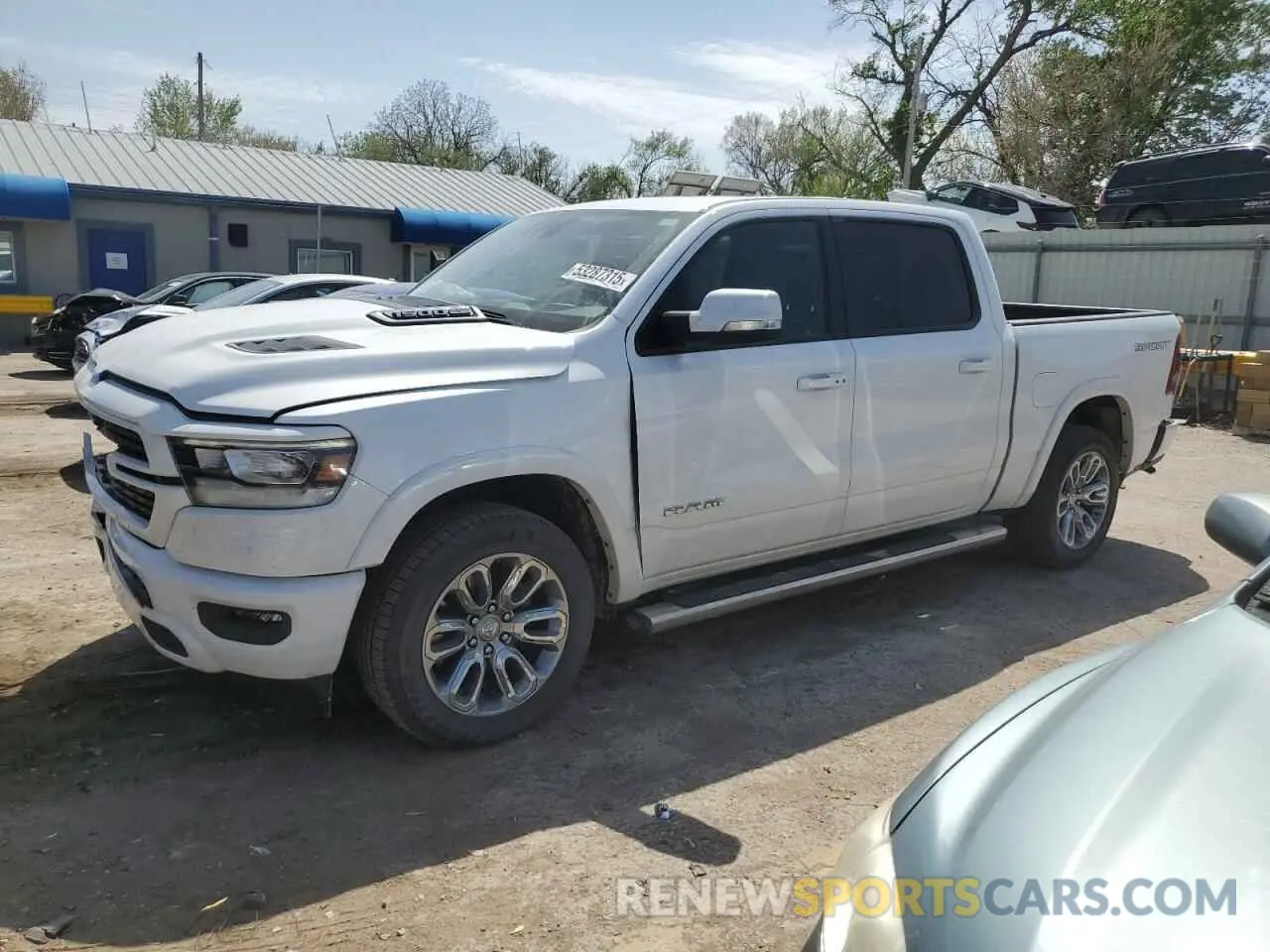 1 Photograph of a damaged car 1C6SRFJT4NN471161 RAM 1500 2022