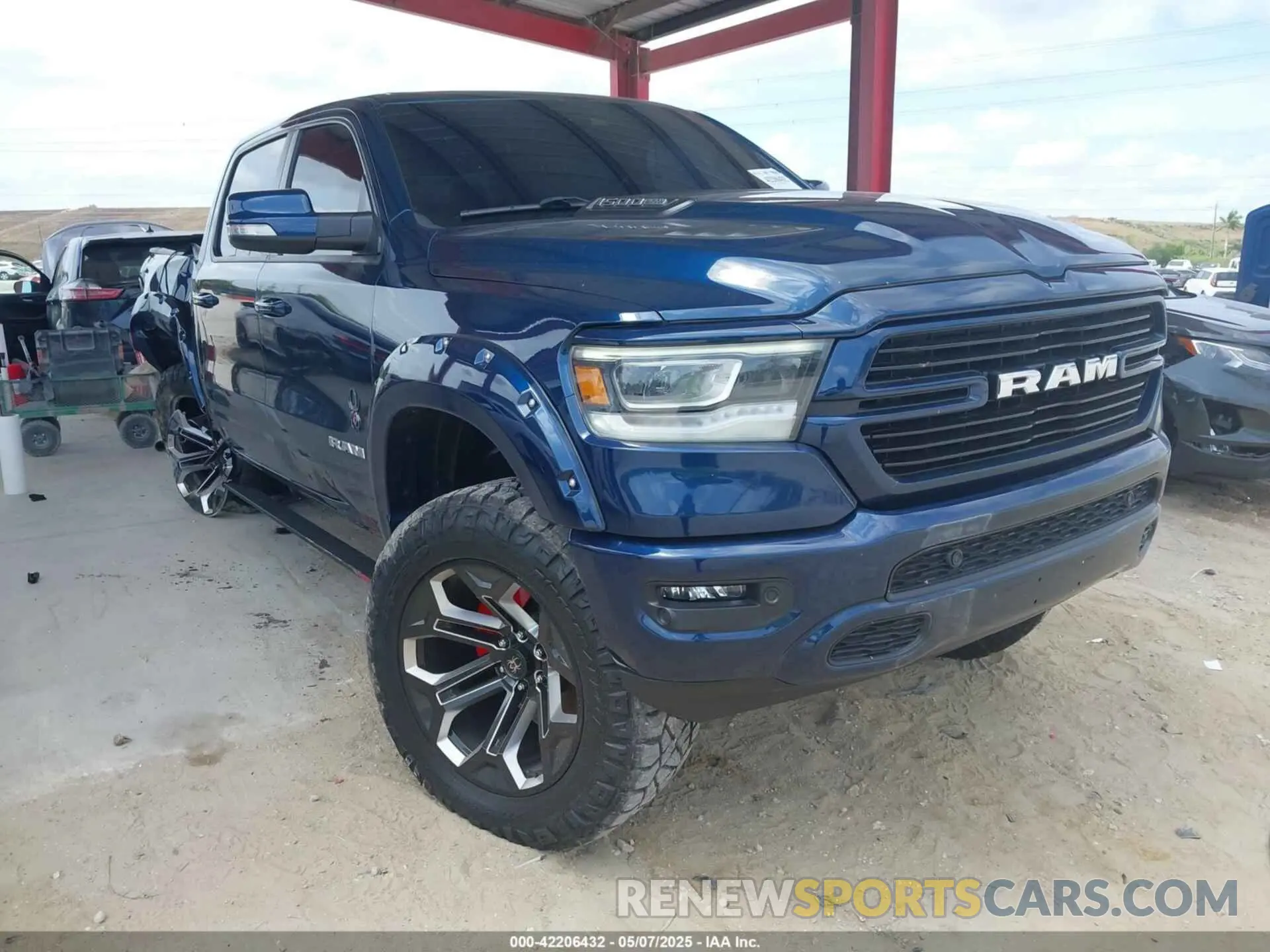 1 Photograph of a damaged car 1C6SRFJT5NN296693 RAM 1500 2022