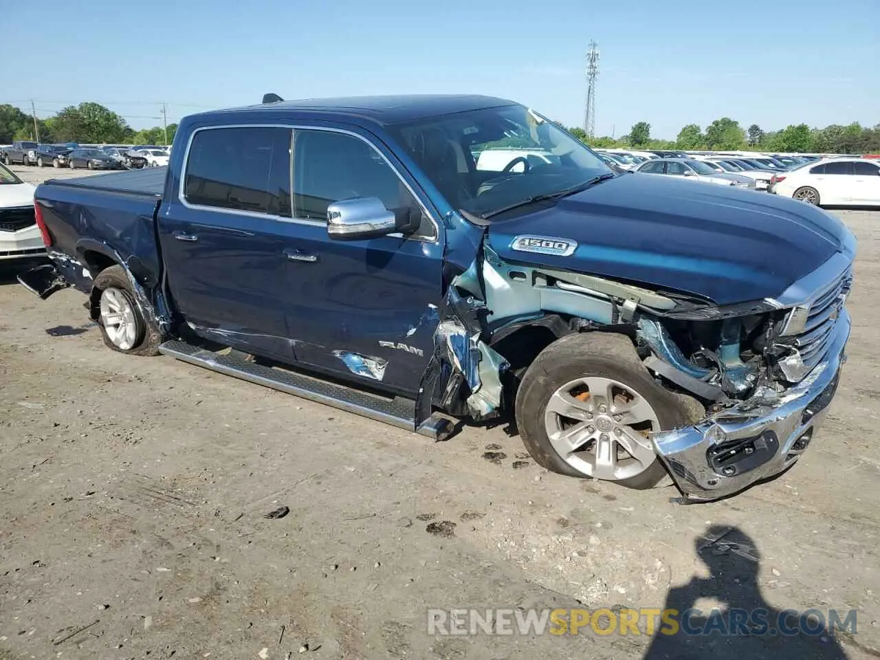 4 Photograph of a damaged car 1C6SRFJT5NN321186 RAM 1500 2022
