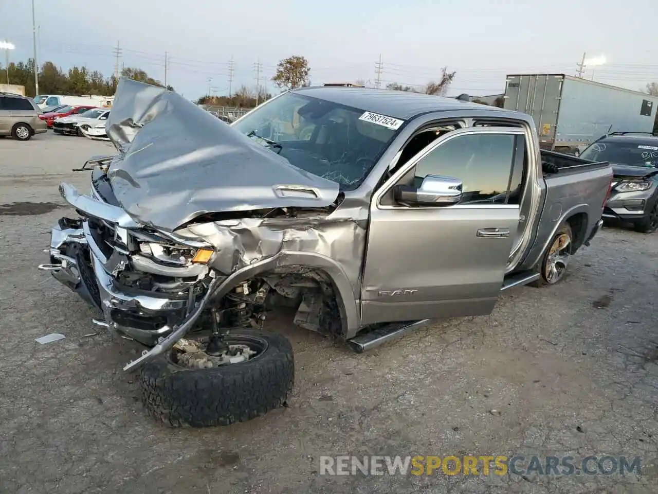 1 Photograph of a damaged car 1C6SRFJT6NN115648 RAM 1500 2022