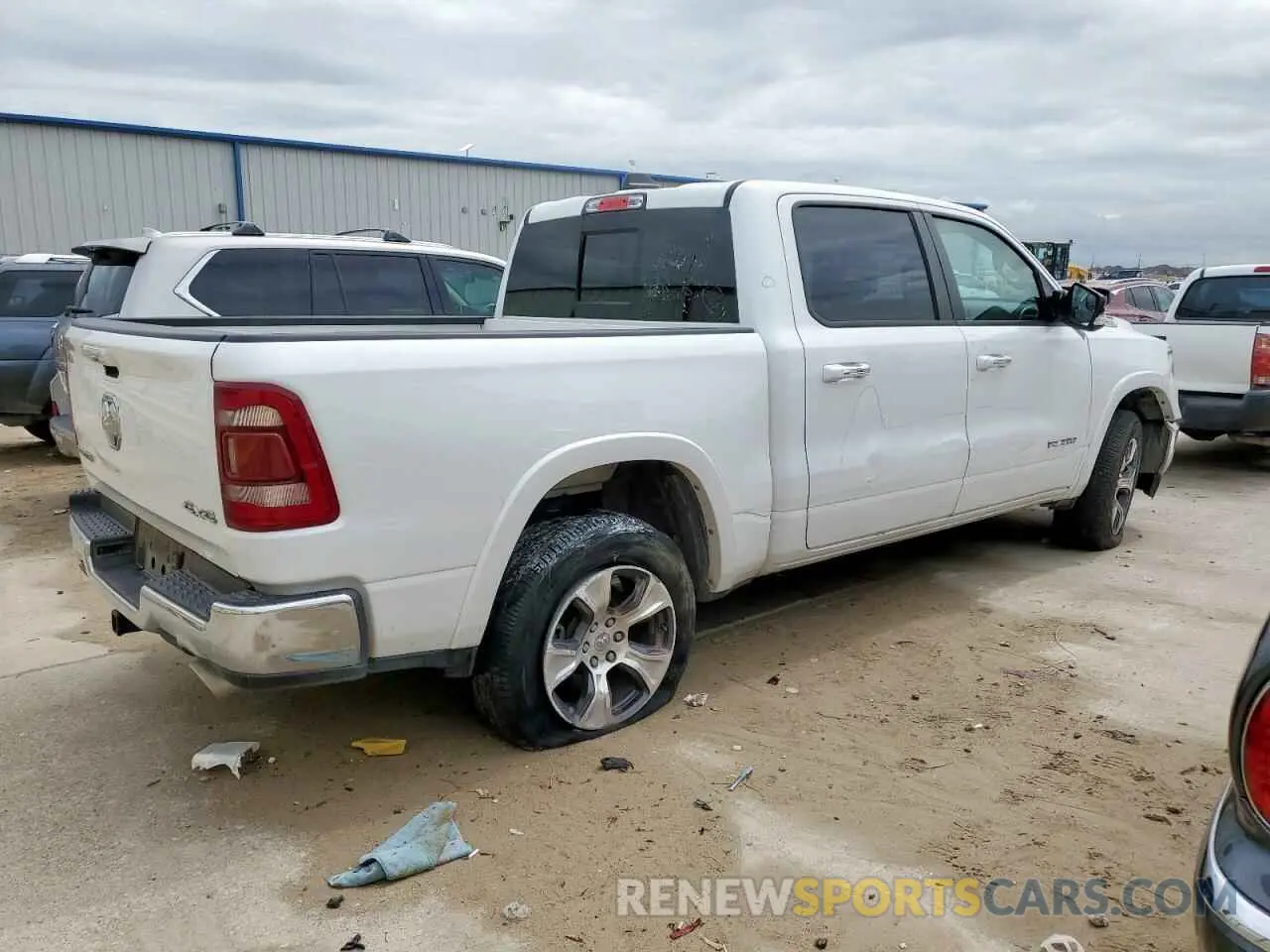 3 Photograph of a damaged car 1C6SRFJT6NN363706 RAM 1500 2022