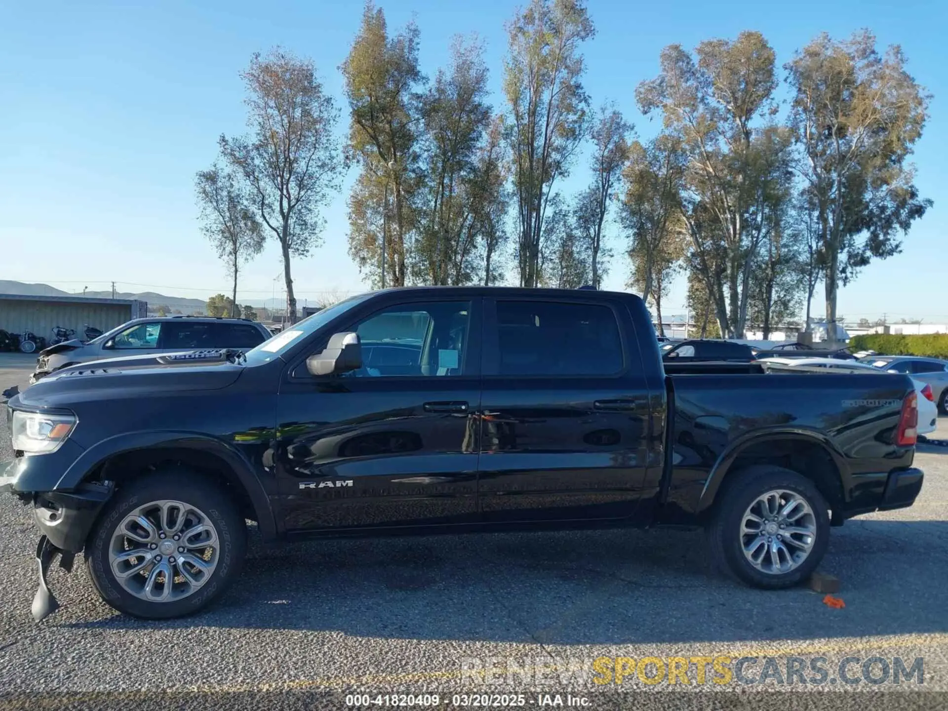14 Photograph of a damaged car 1C6SRFJT6NN392154 RAM 1500 2022