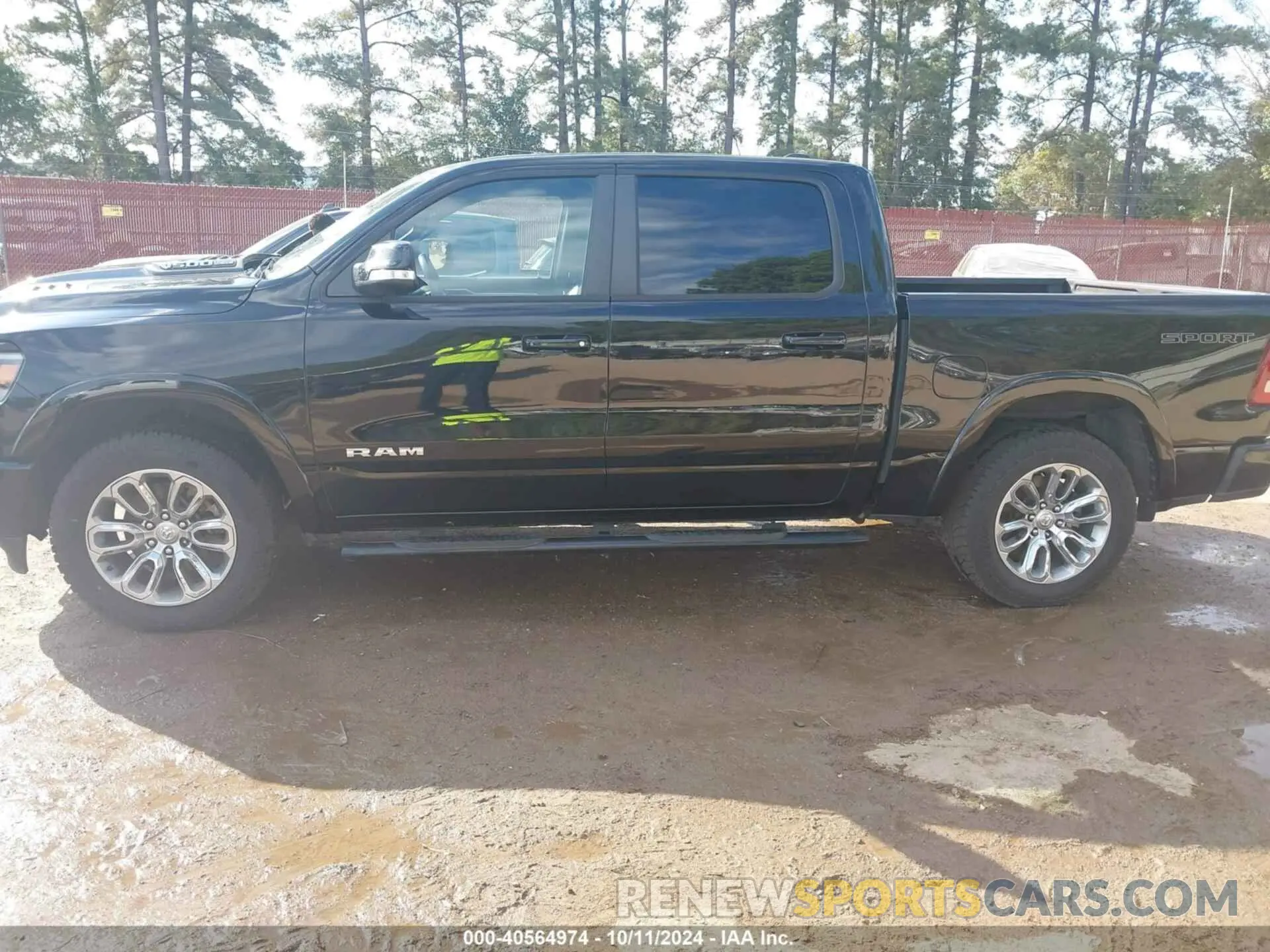 14 Photograph of a damaged car 1C6SRFJT8NN366655 RAM 1500 2022