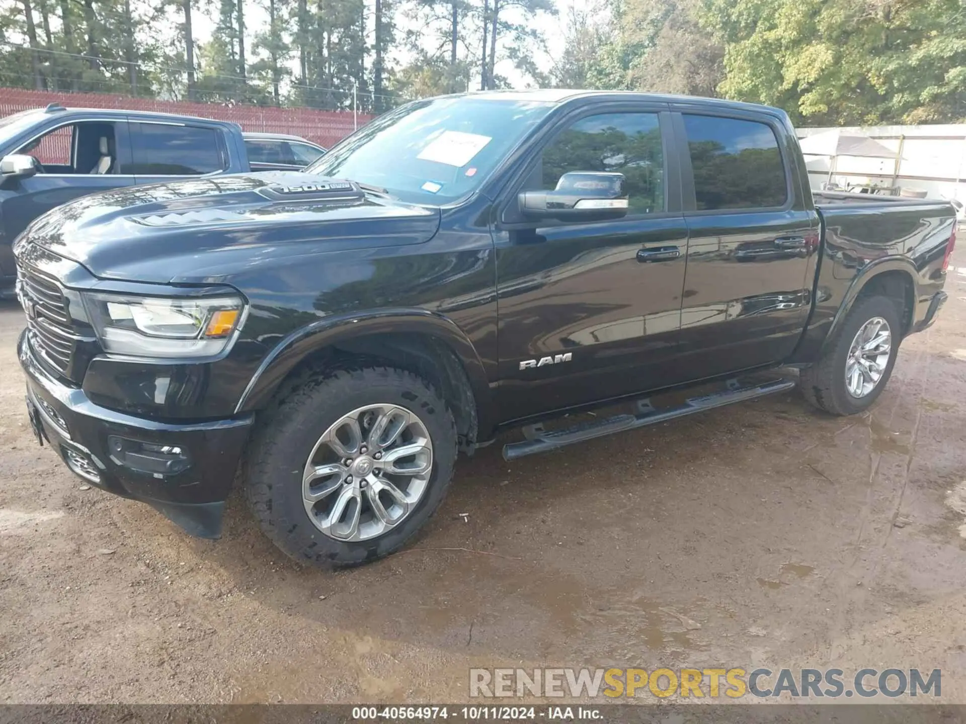 2 Photograph of a damaged car 1C6SRFJT8NN366655 RAM 1500 2022