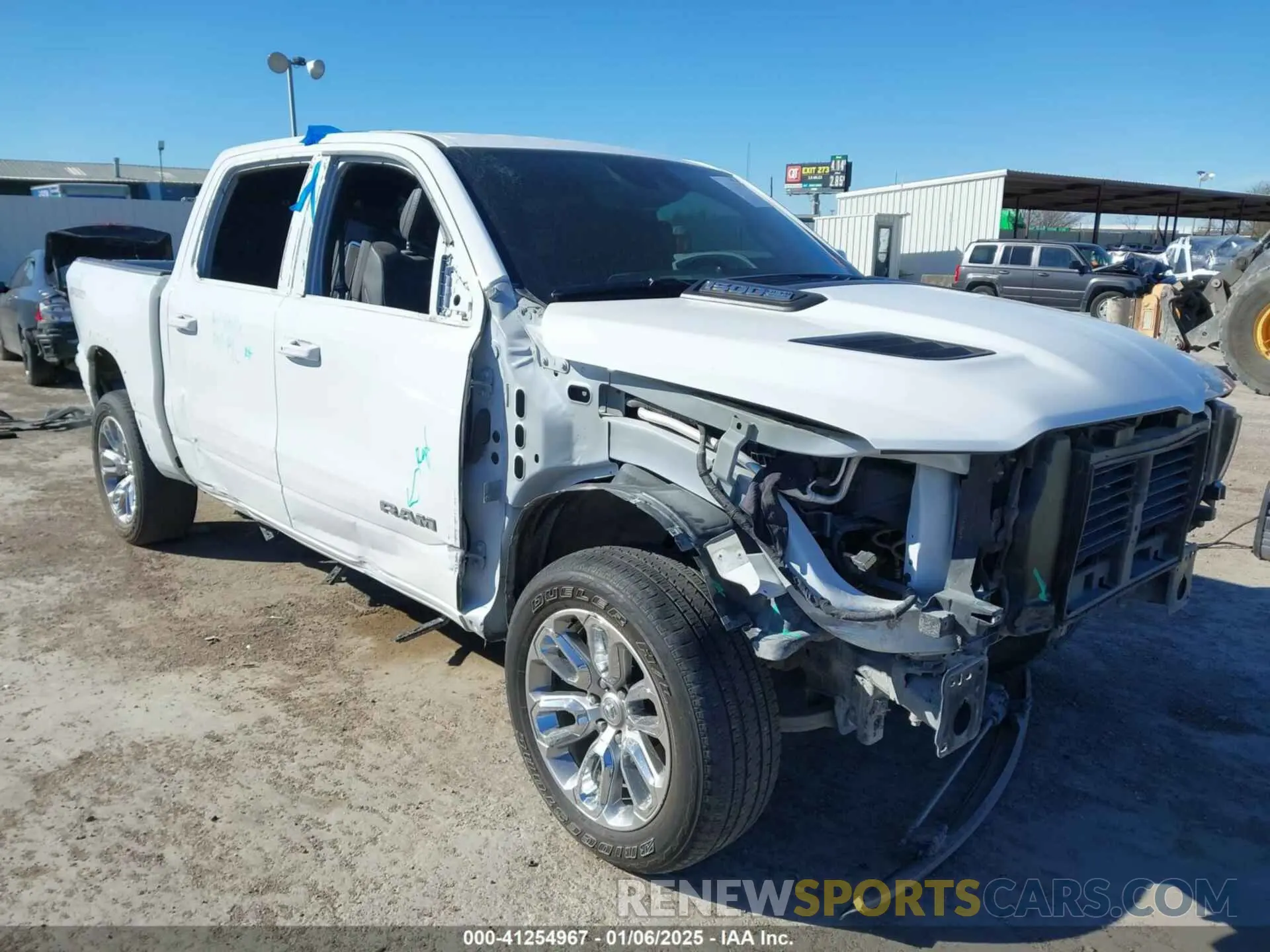 6 Photograph of a damaged car 1C6SRFJT8NN418429 RAM 1500 2022