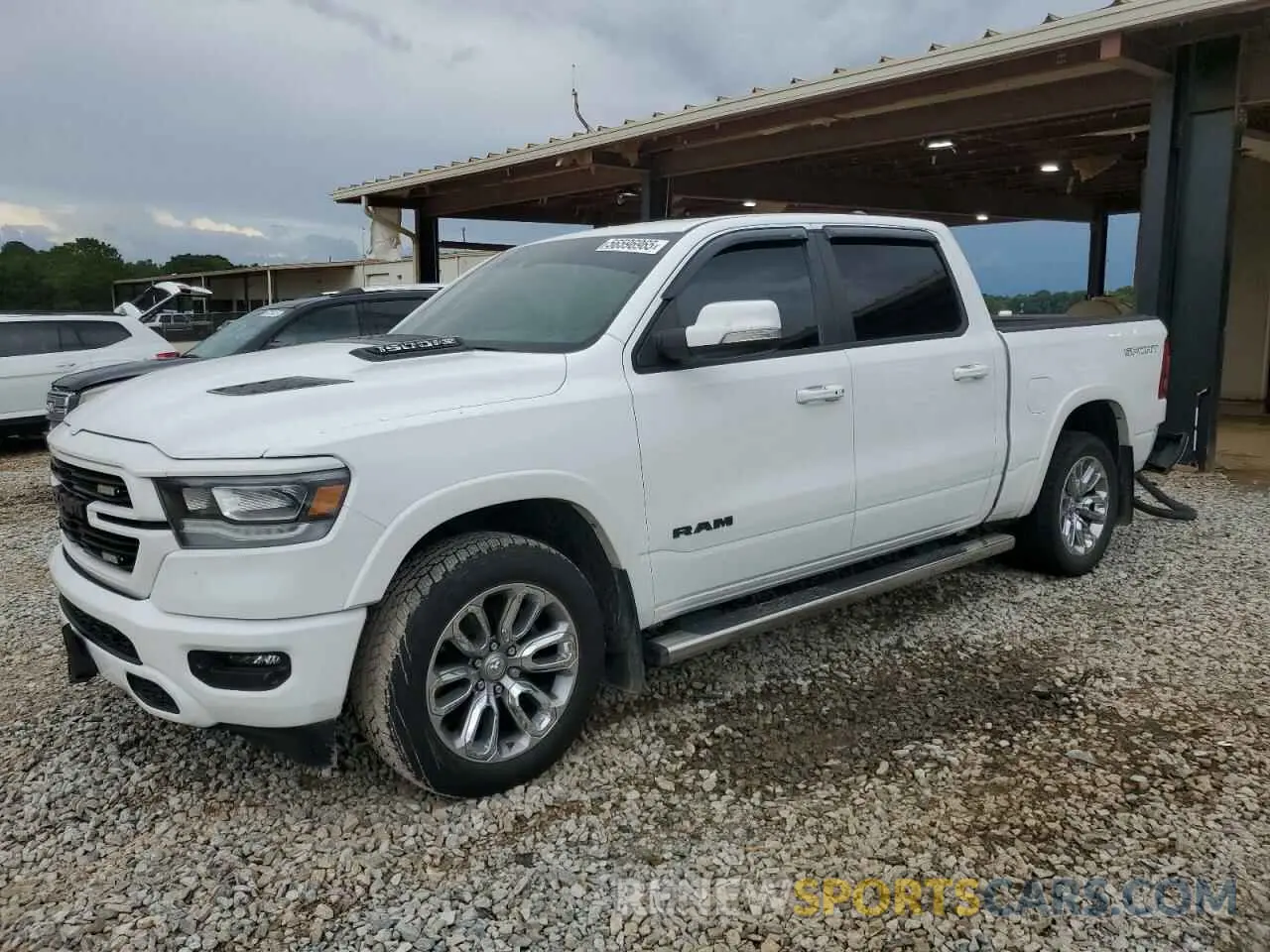 1 Photograph of a damaged car 1C6SRFJT9NN434509 RAM 1500 2022