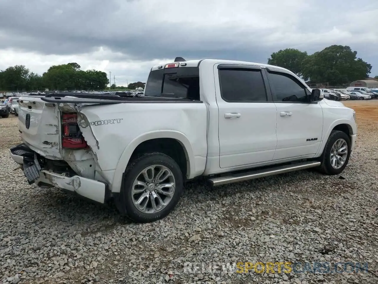 3 Photograph of a damaged car 1C6SRFJT9NN434509 RAM 1500 2022